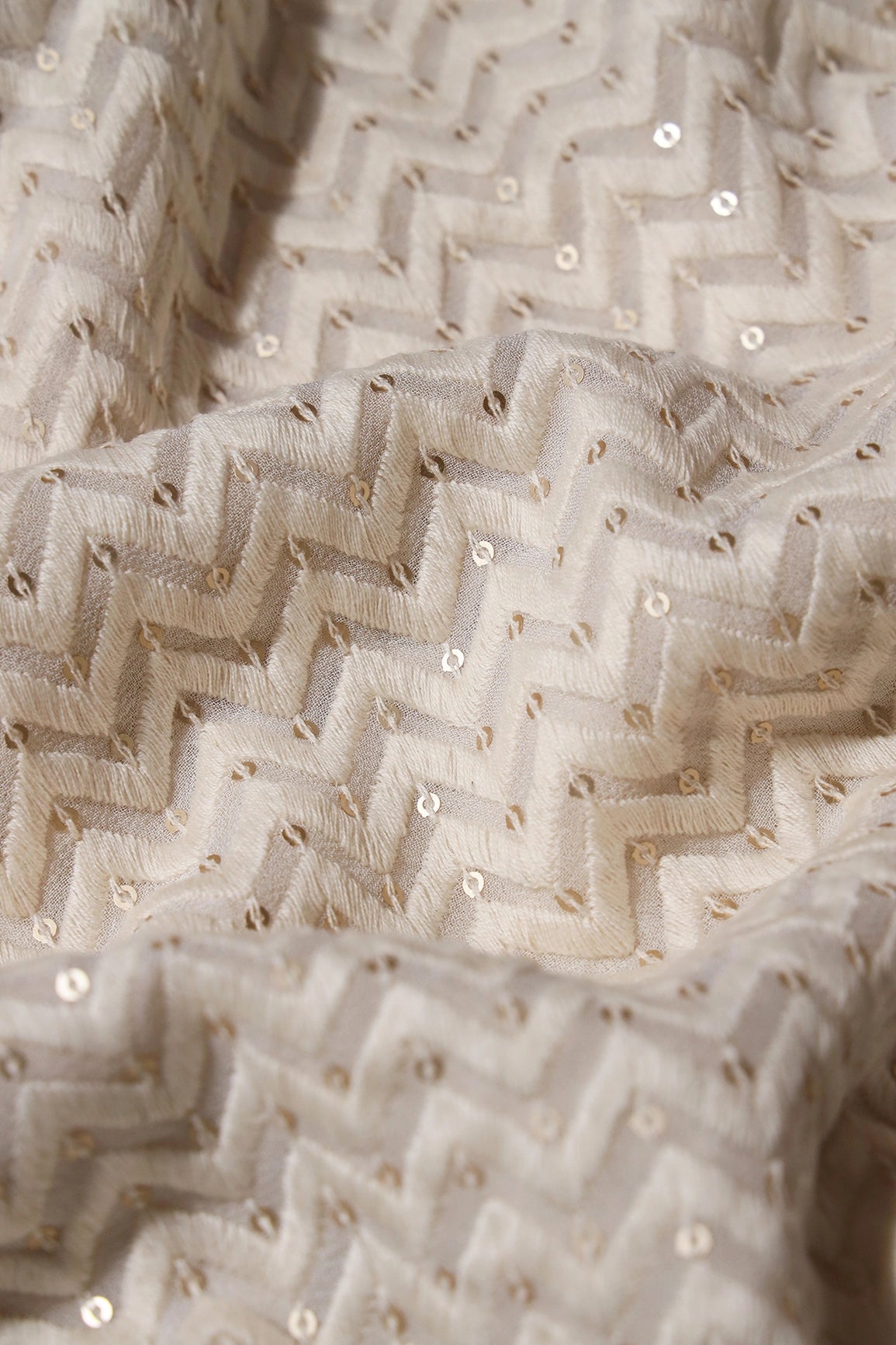 White Thread With Gold Sequins Chevron Embroidery Work On White Dyeable Viscose Georgette Fabric - doeraa