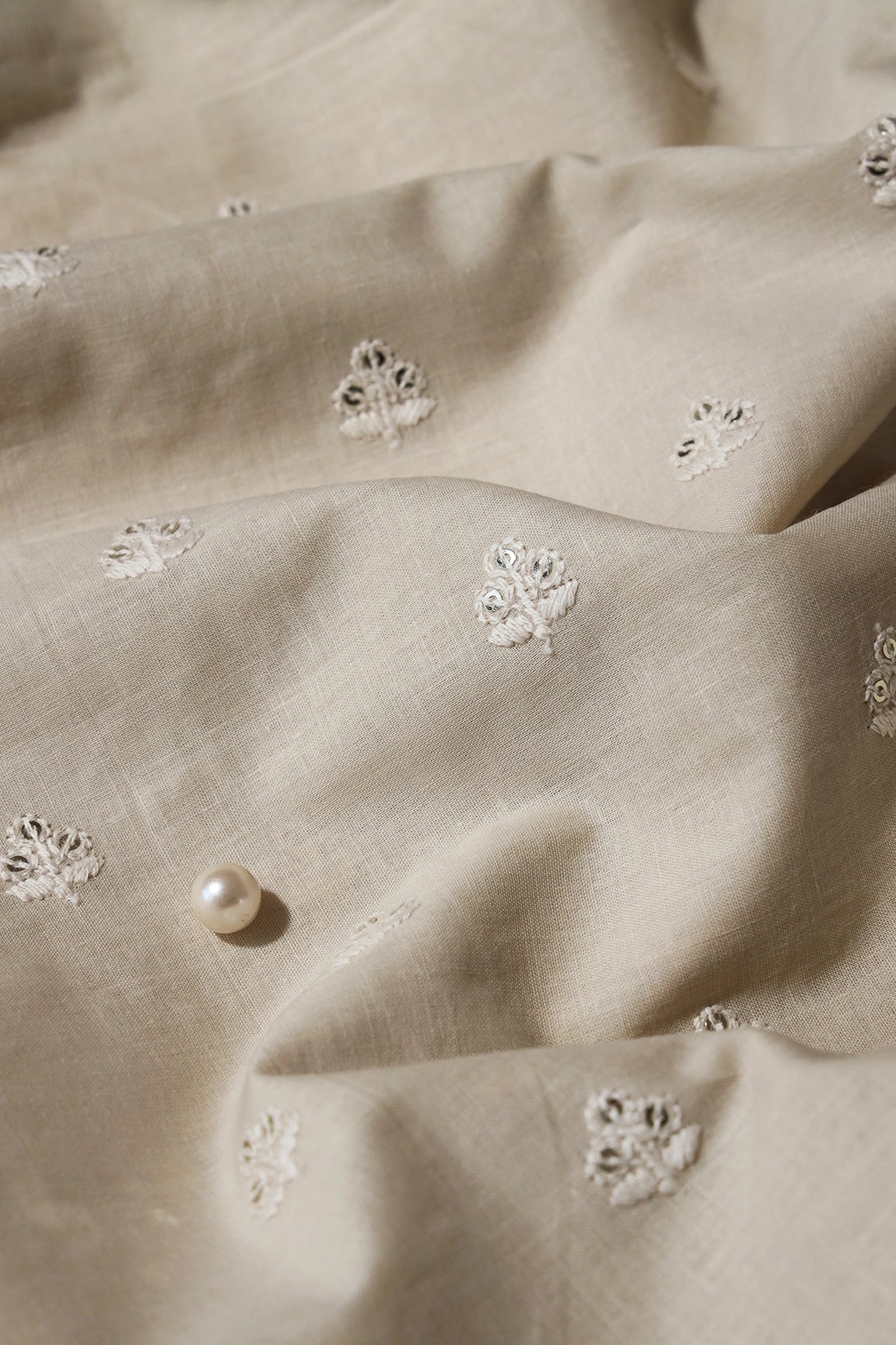 White Thread With Gold Sequins Small Floral Booti Embroidery Work On Cream Cotton Fabric - doeraa