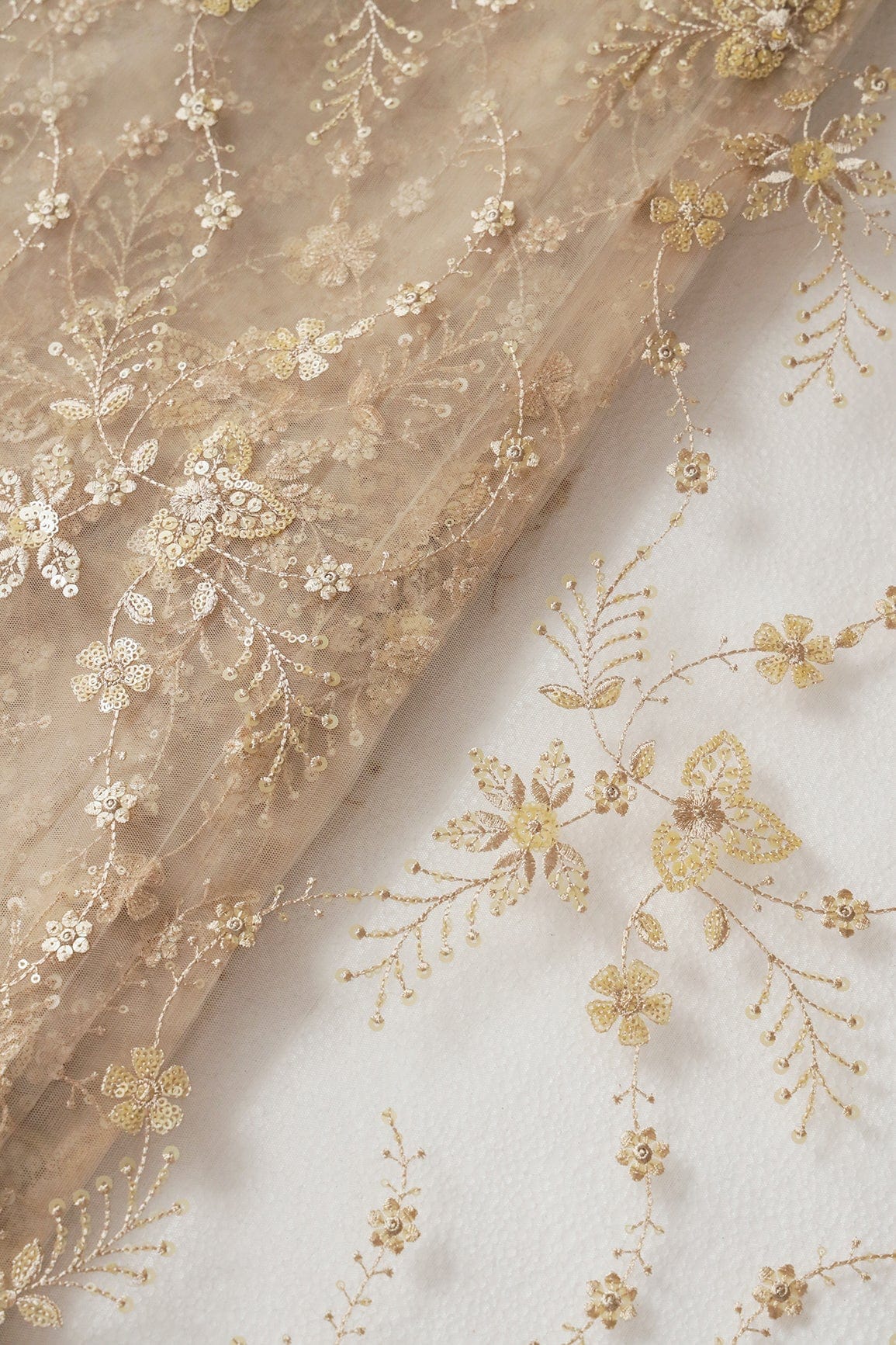 Beautiful Beige Thread With Sequins Floral Embroidery Work On Light Beige Soft Net Fabric - doeraa