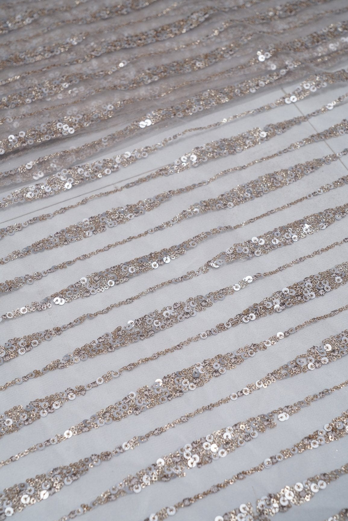 doeraa Embroidery Fabrics 1 Meter Cut Piece of Gold And Silver Sequins With Cloudy Grey Thread Embroidery On Cloudy Grey Soft Net