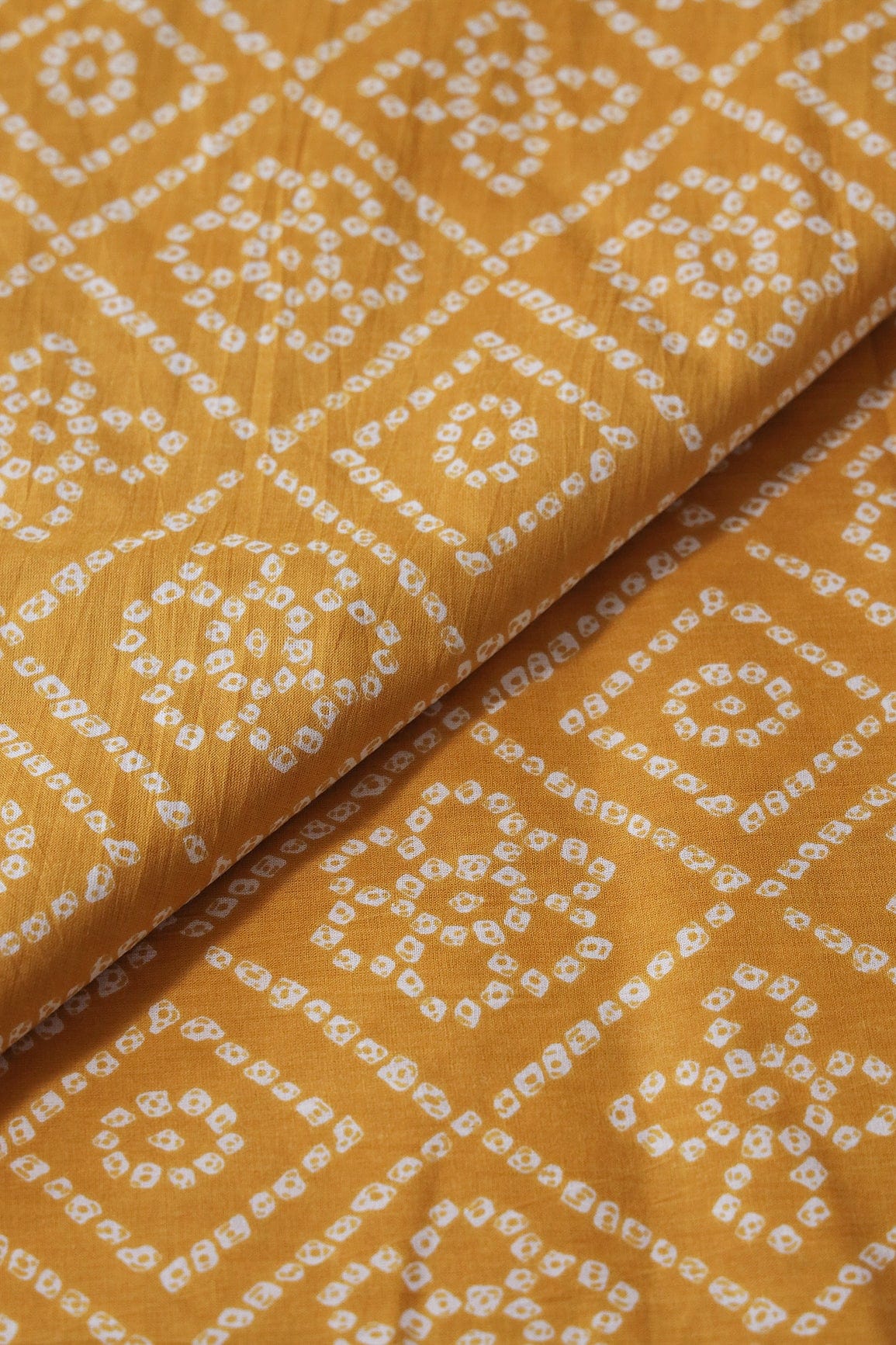 doeraa Prints Mustard Yellow And White Bandhani Print On Pure Cotton Fabric