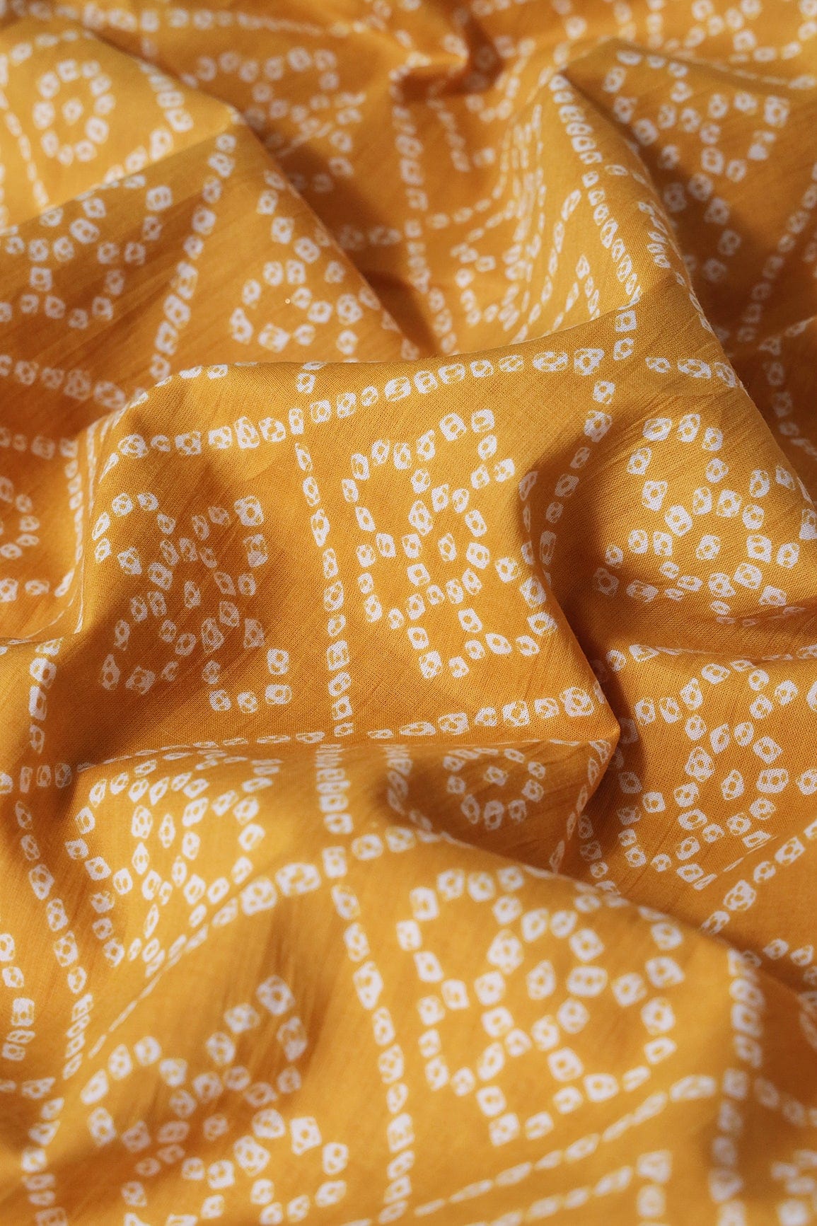 doeraa Prints Mustard Yellow And White Bandhani Print On Pure Cotton Fabric