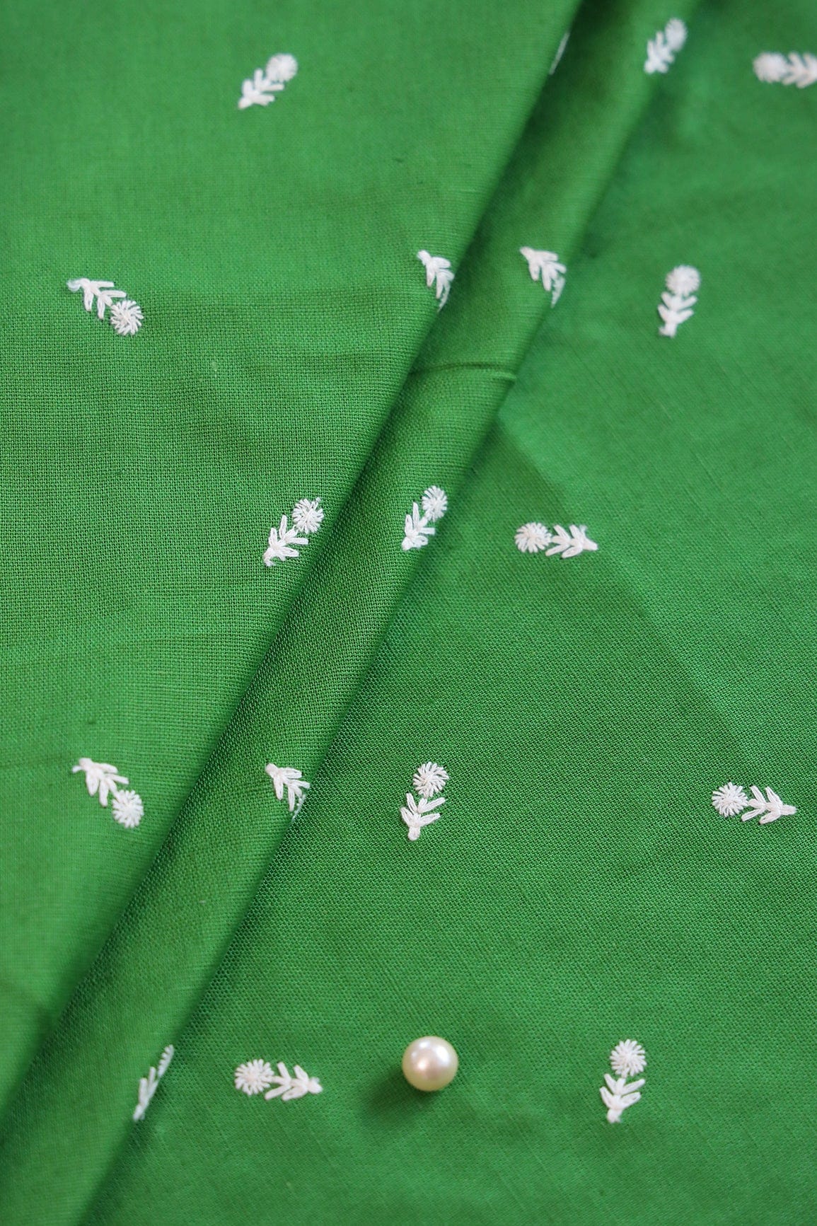 White Thread Small Floral Motif Embroidery Work On Green Cotton Linen Fabric - doeraa