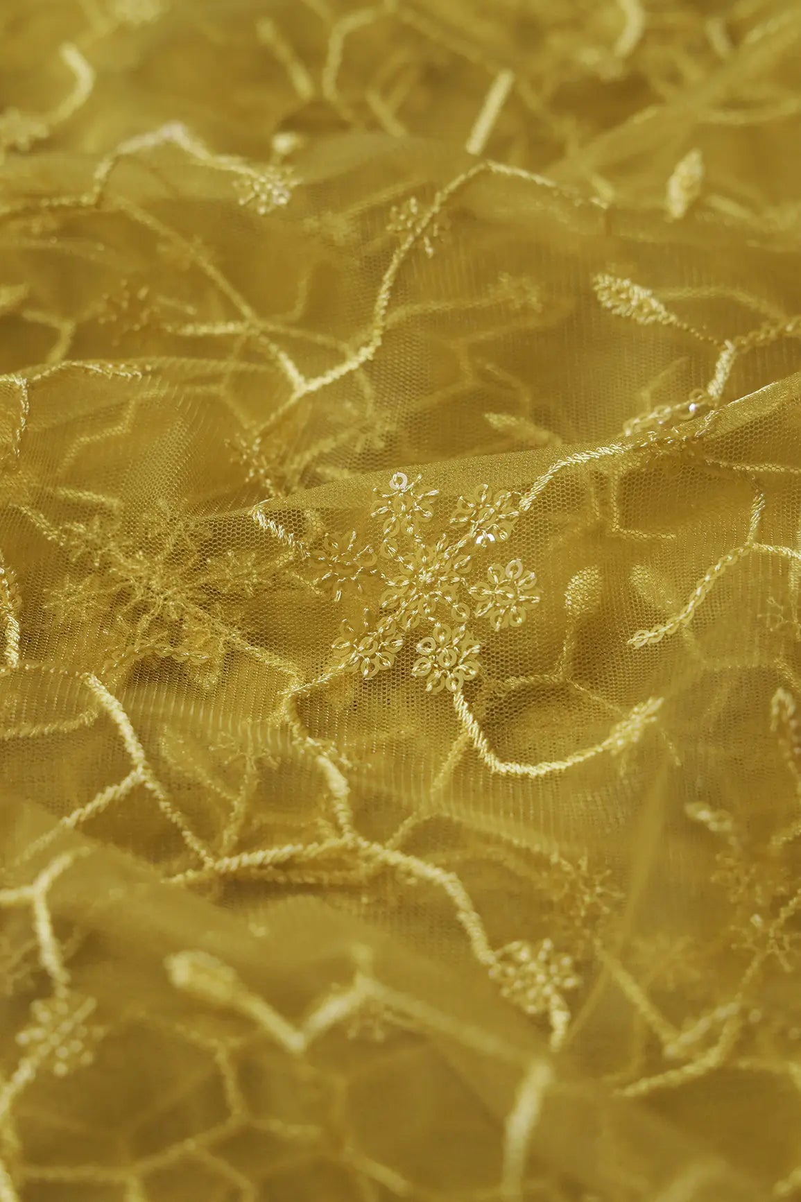 Beautiful Yellow Sequins Small Floral Embroidery On Yellow Soft Net Fabric