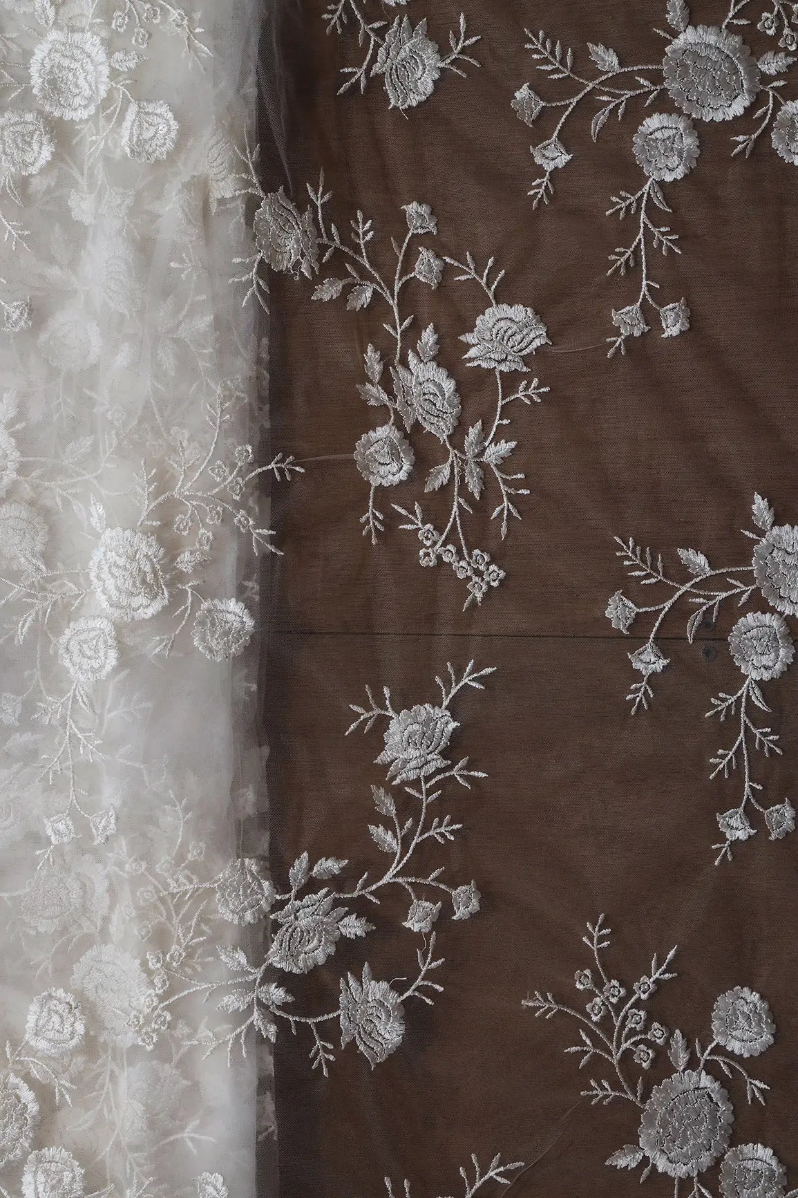 White Thread With Sequins Floral Embroidery On White Dyeable Soft Net Fabric