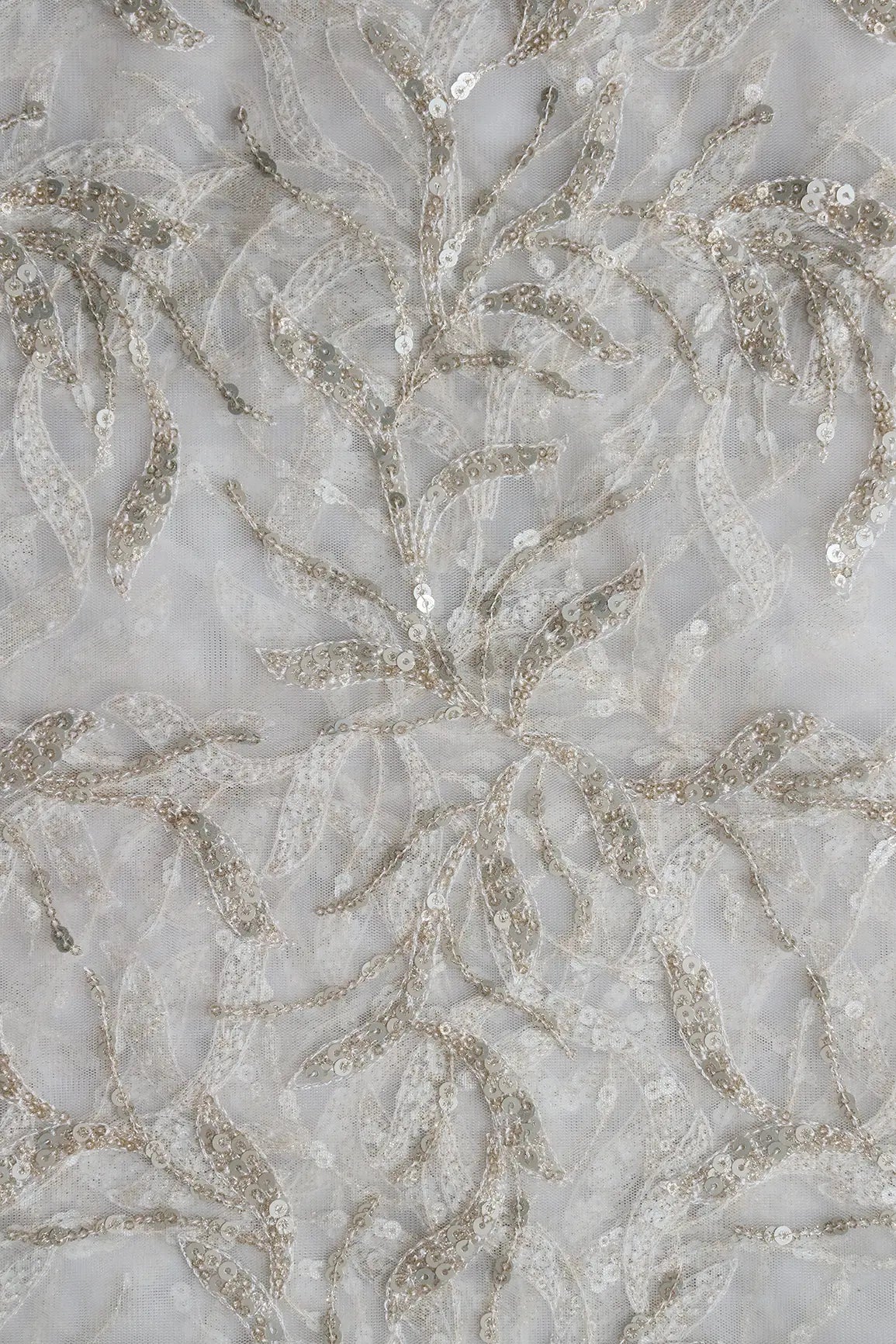 Gold And Silver Sequins Leafy Floral Embroidery On Dyeable White Soft Net Fabric