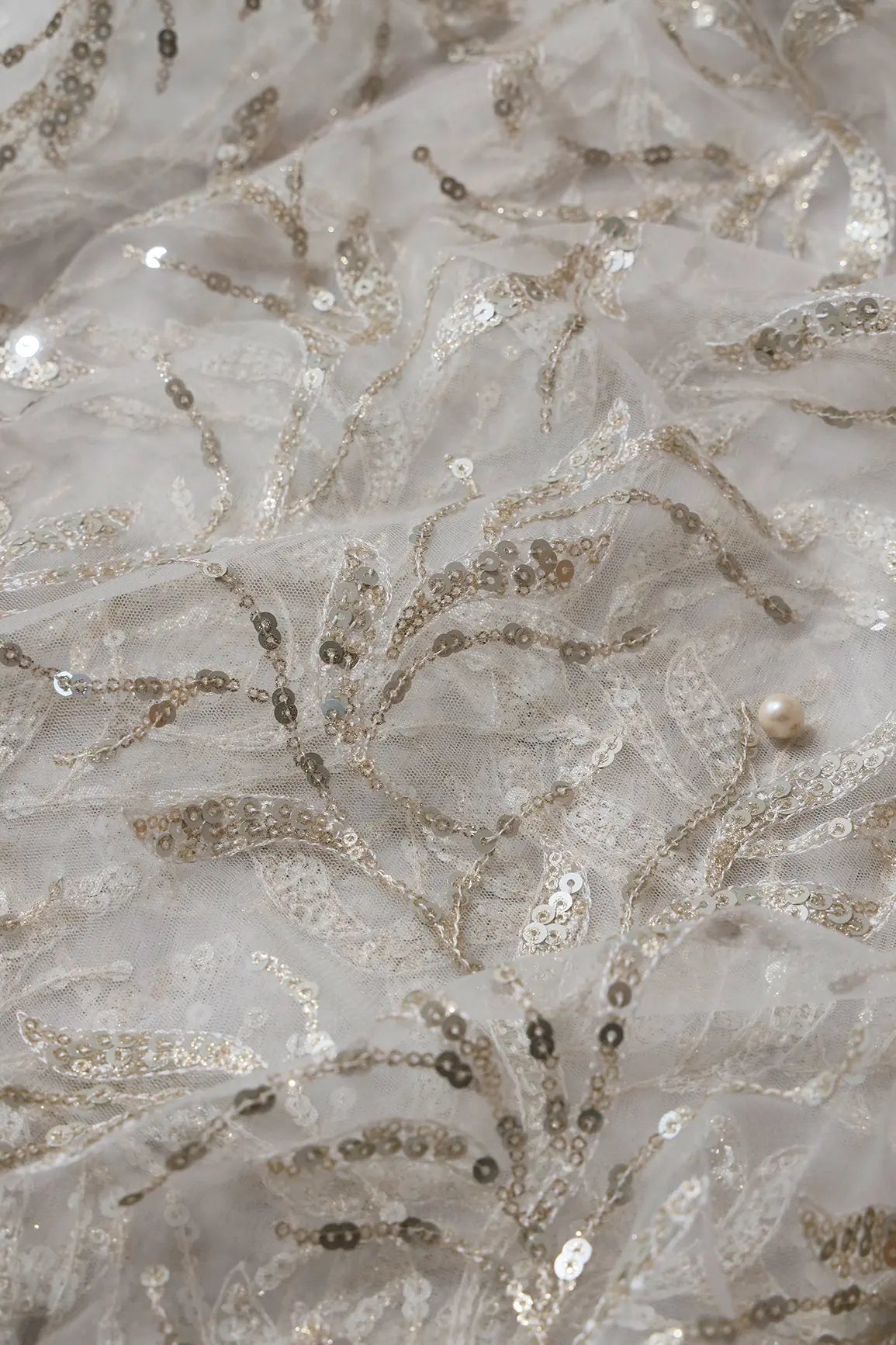 Gold And Silver Sequins Leafy Floral Embroidery On Dyeable White Soft Net Fabric