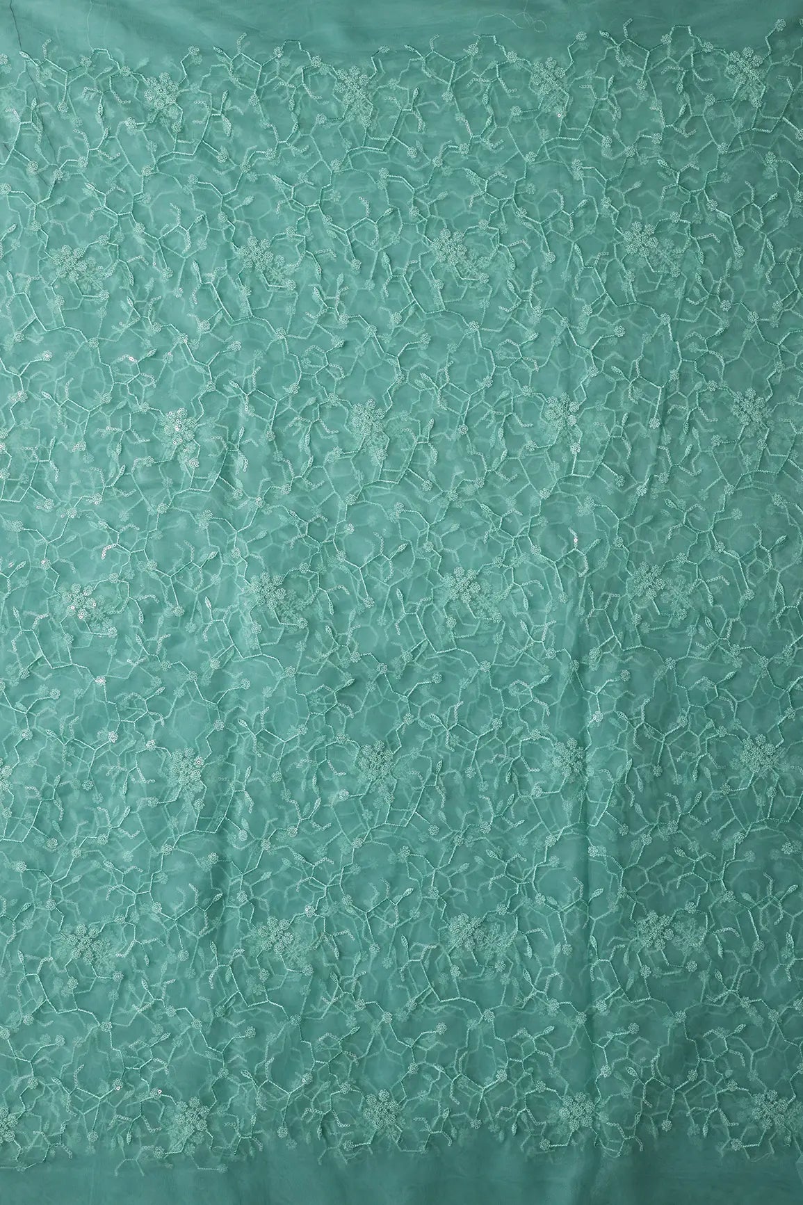 Beautiful Water Sequins Small Floral Embroidery On Sea Green Soft Net Fabric