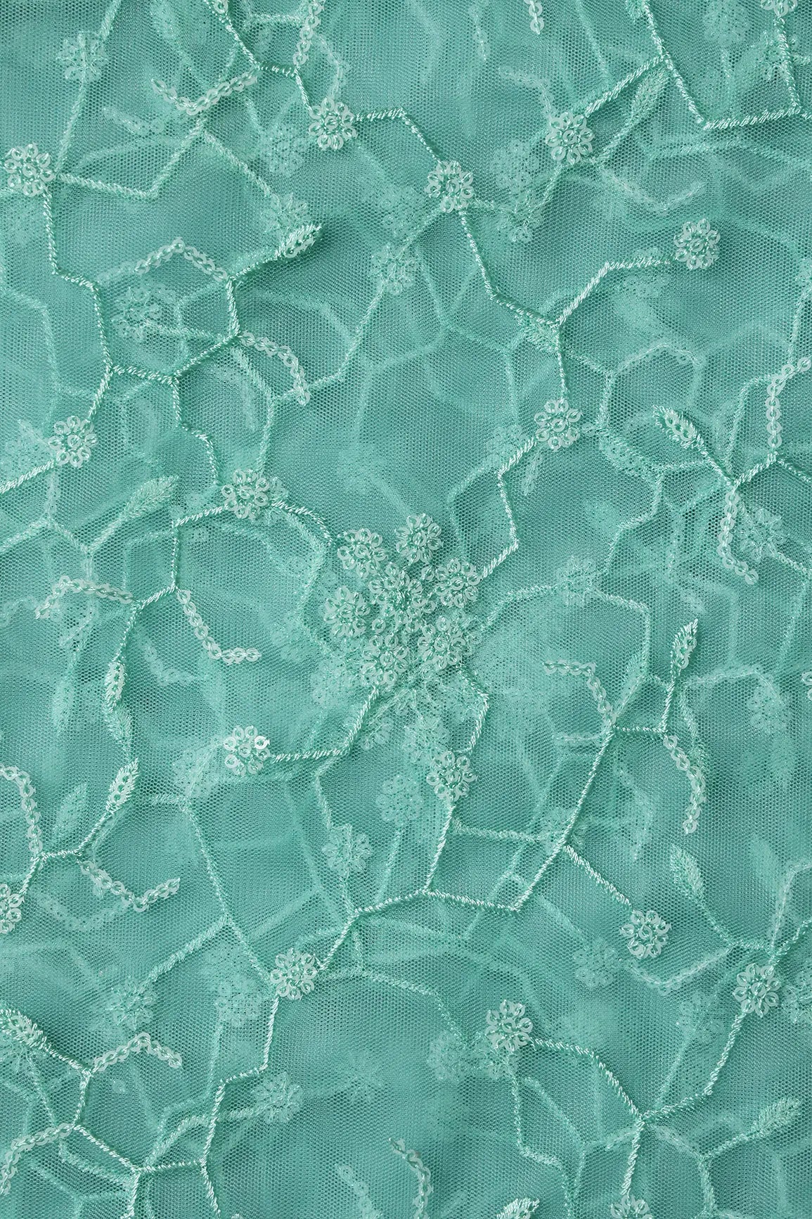 Beautiful Water Sequins Small Floral Embroidery On Sea Green Soft Net Fabric