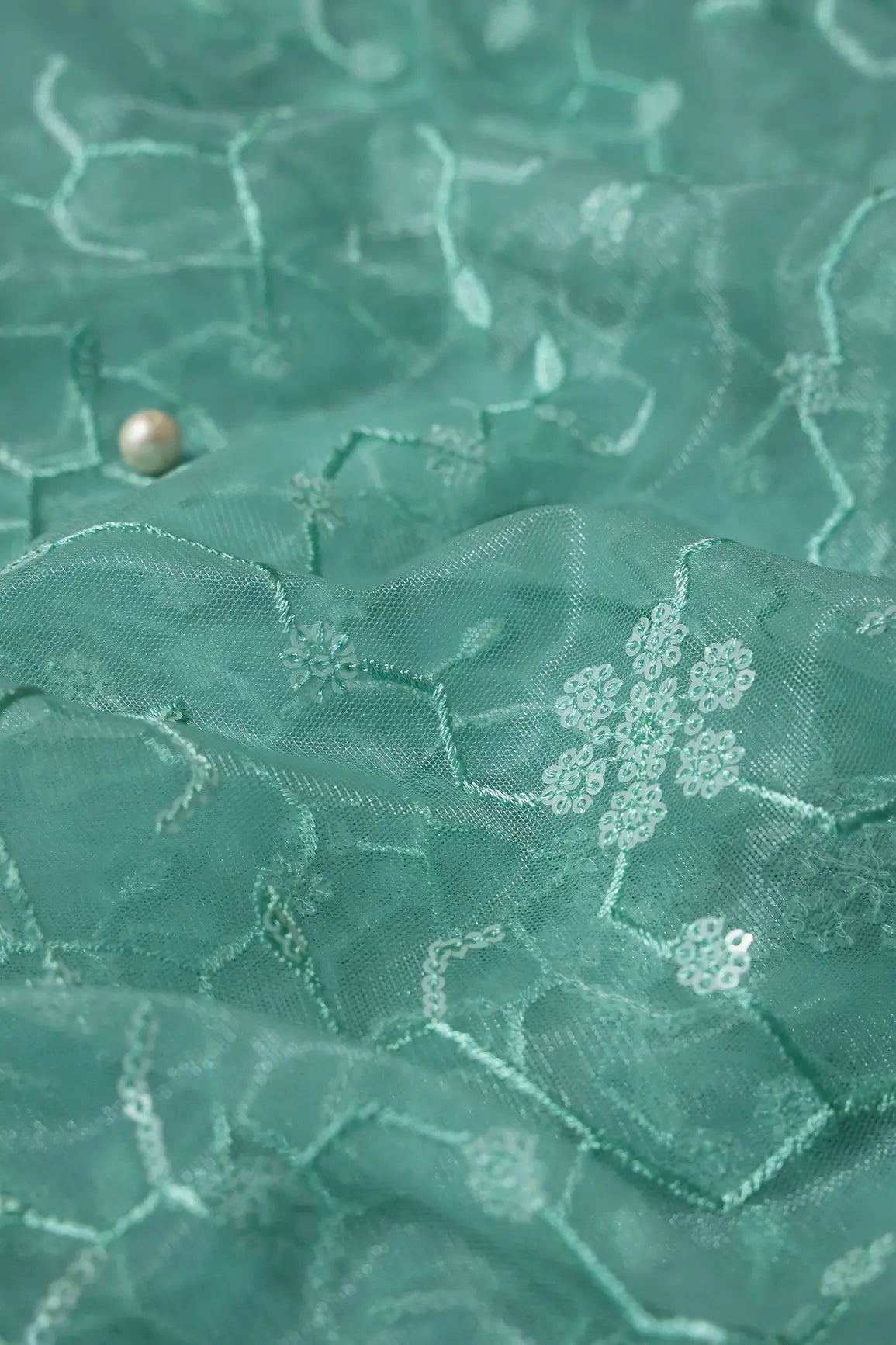 Beautiful Water Sequins Small Floral Embroidery On Sea Green Soft Net Fabric