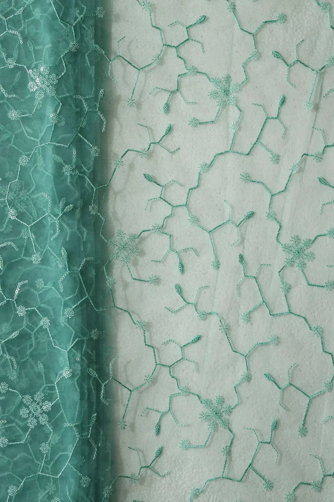 Beautiful Water Sequins Small Floral Embroidery On Sea Green Soft Net Fabric