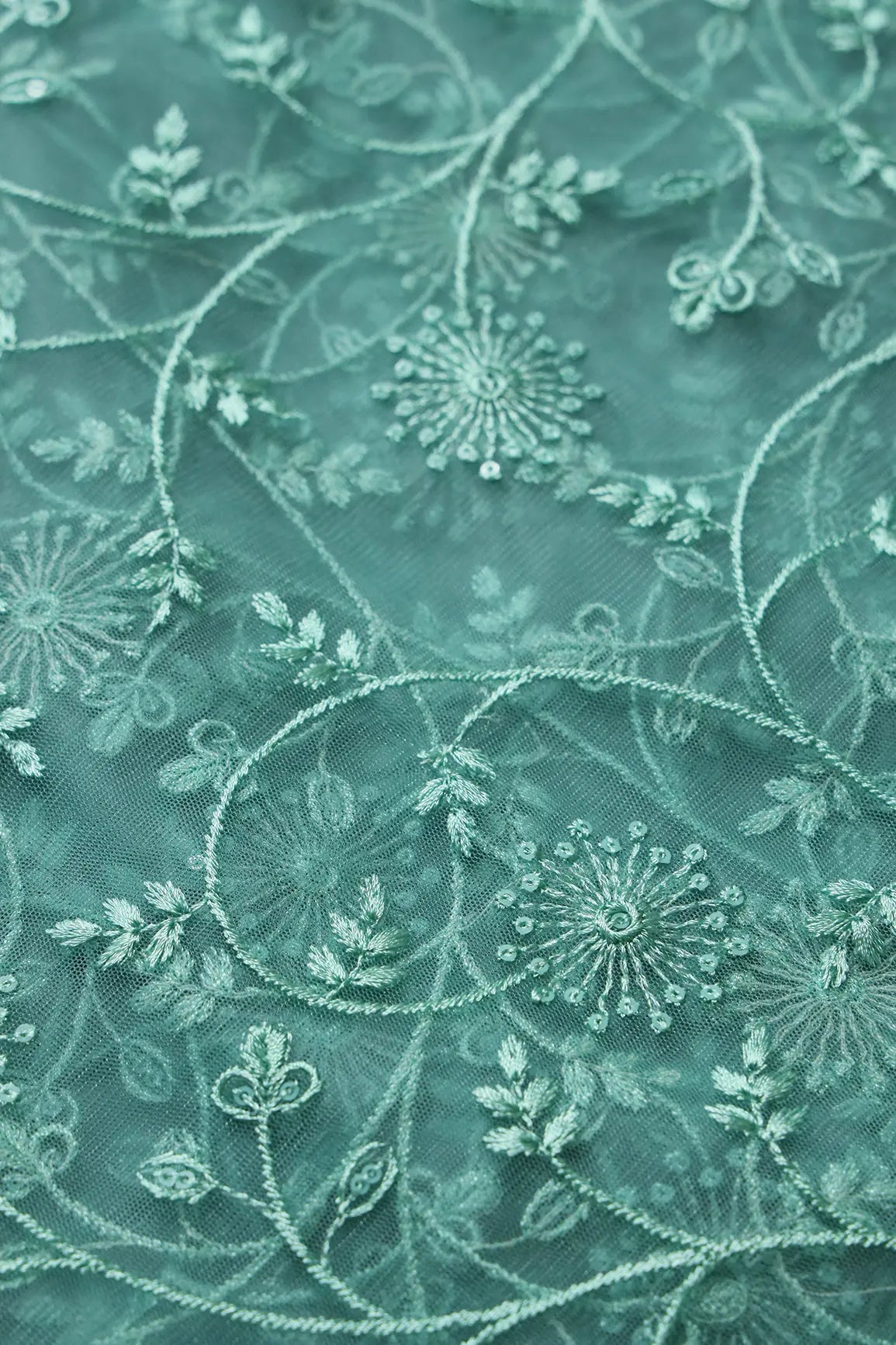 Teal Sequins With Teal Thread Floral Embroidery On Teal Soft Net Fabric