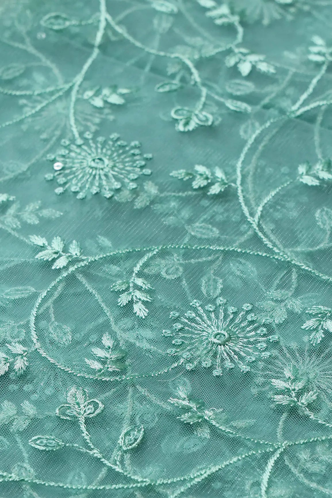 Teal Sequins With Teal Thread Floral Embroidery On Teal Soft Net Fabric