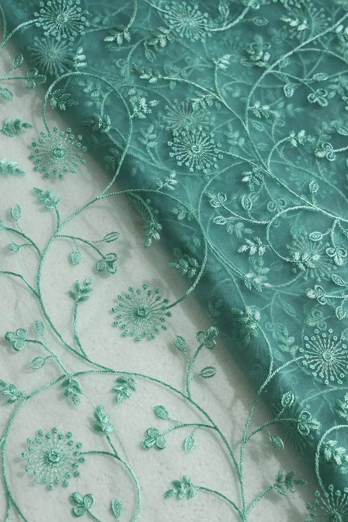 Teal Sequins With Teal Thread Floral Embroidery On Teal Soft Net Fabric