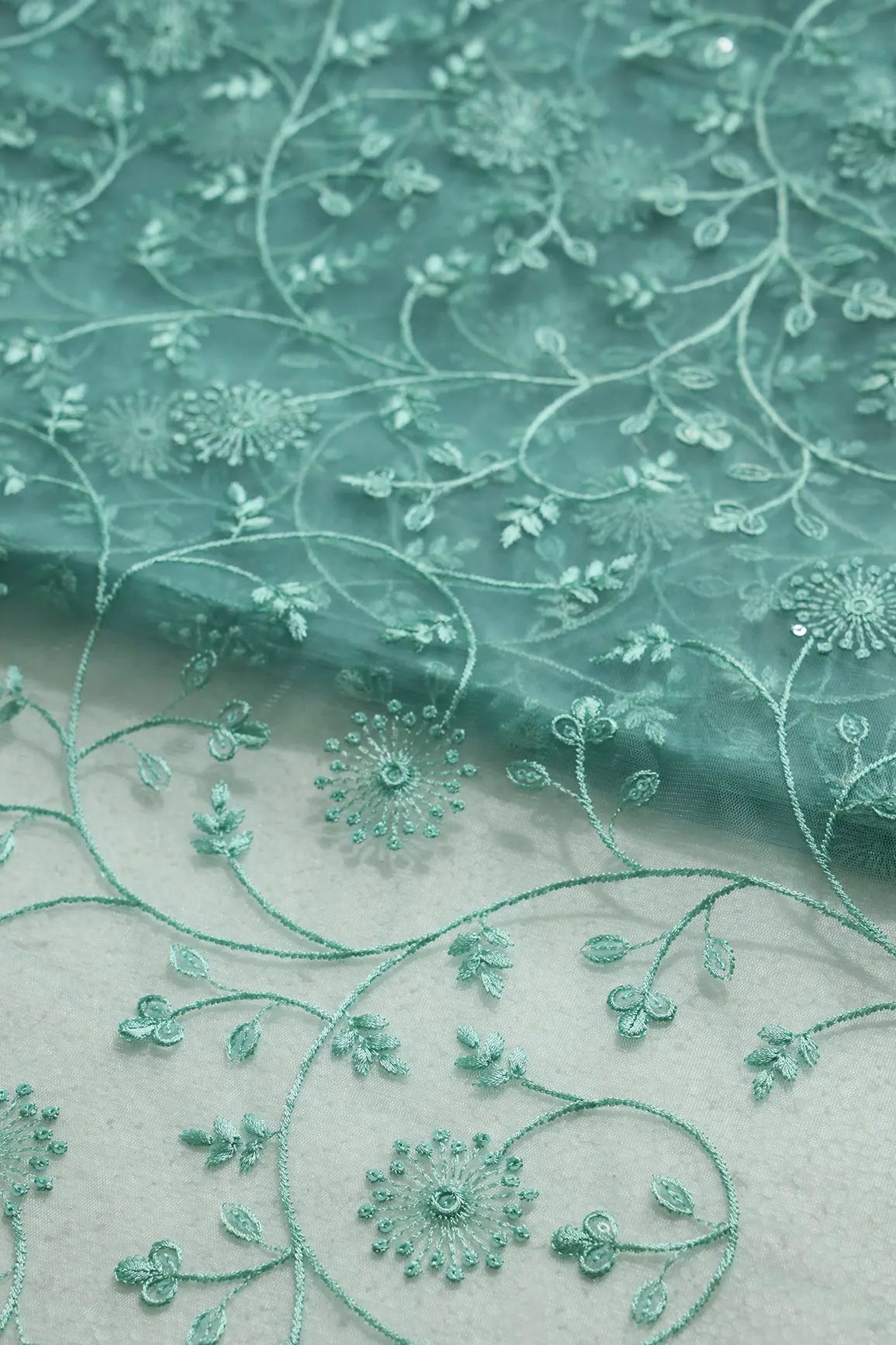 Teal Sequins With Teal Thread Floral Embroidery On Teal Soft Net Fabric