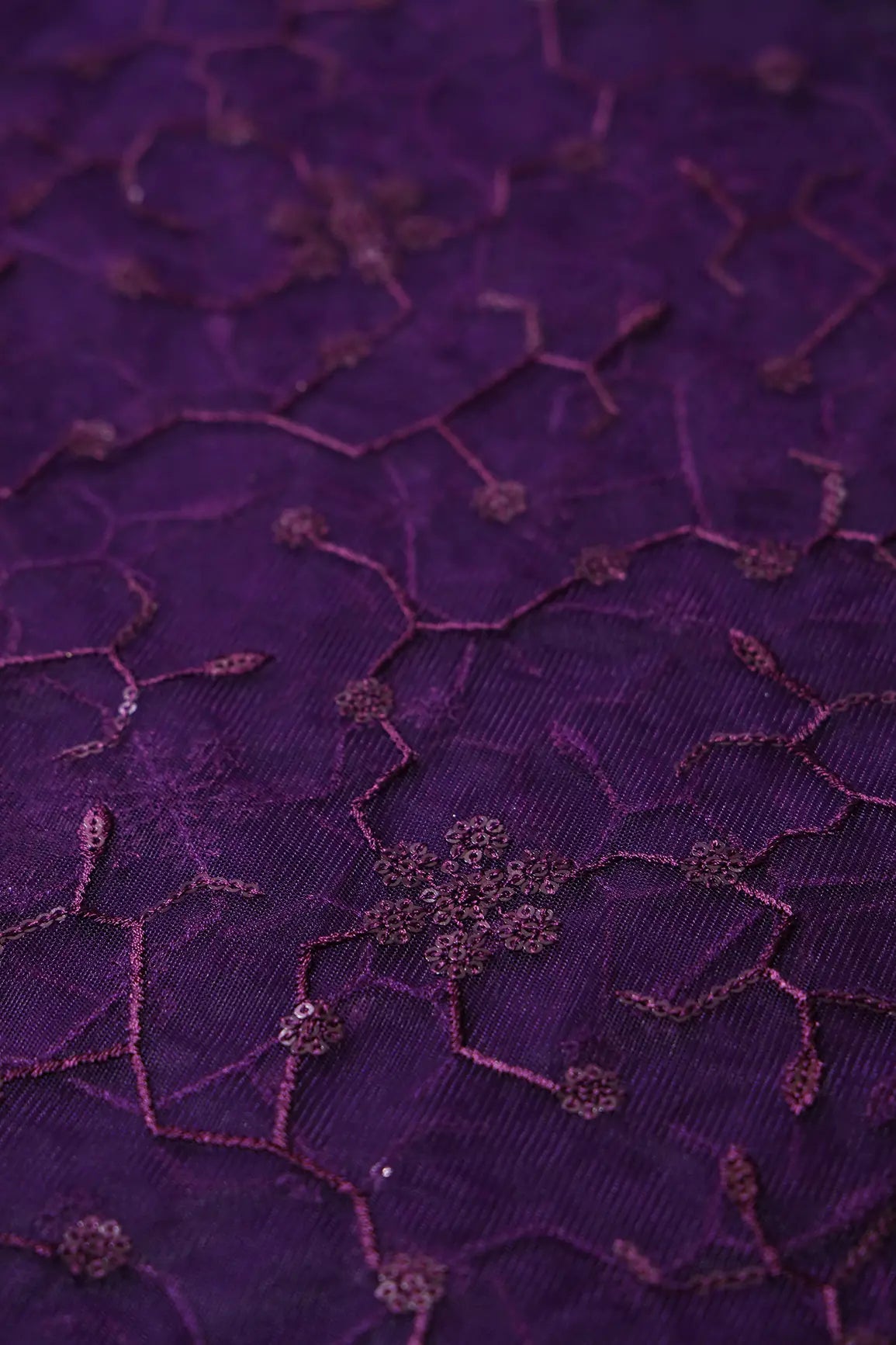 Beautiful Purple Sequins Small Floral Embroidery On Dark Purple Soft Net Fabric