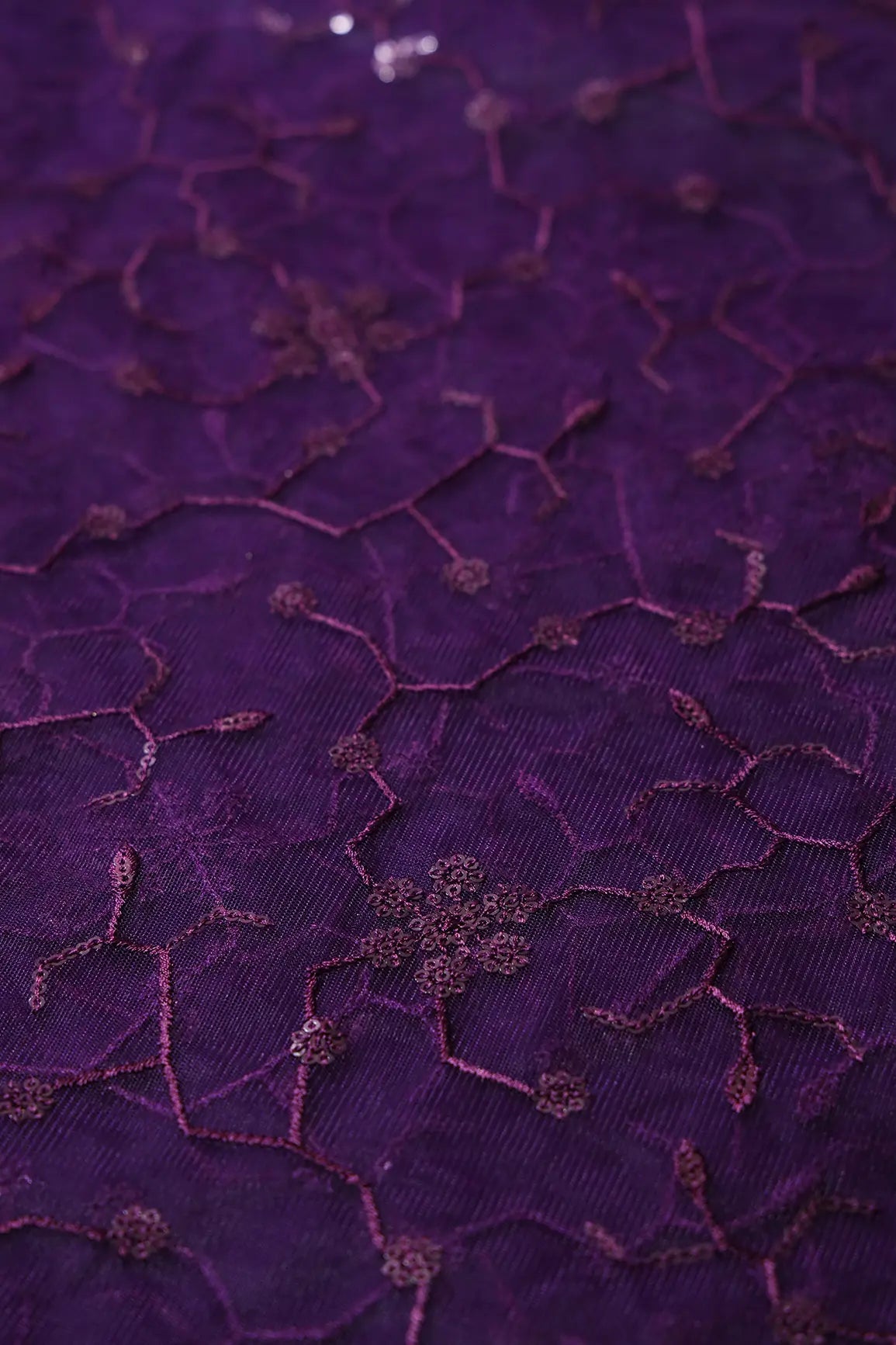 Beautiful Purple Sequins Small Floral Embroidery On Dark Purple Soft Net Fabric