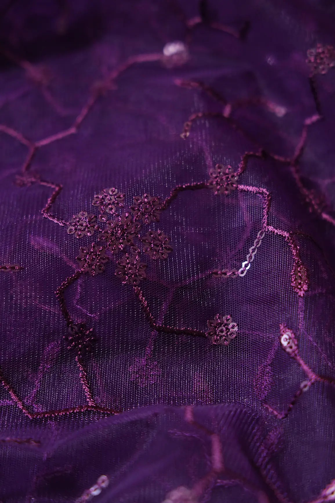 Beautiful Purple Sequins Small Floral Embroidery On Dark Purple Soft Net Fabric