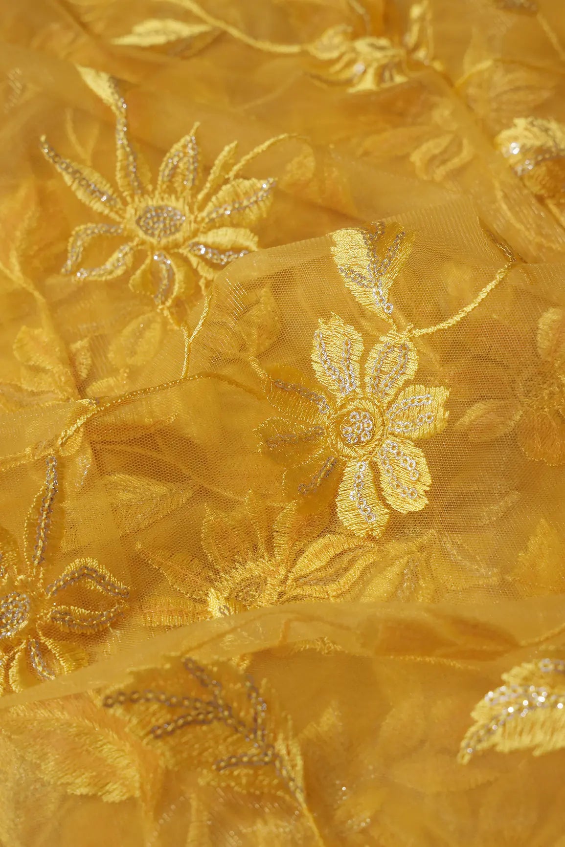 Yellow Thread With Gold  Sequins Floral Embroidery On Yellow Soft Net Fabric