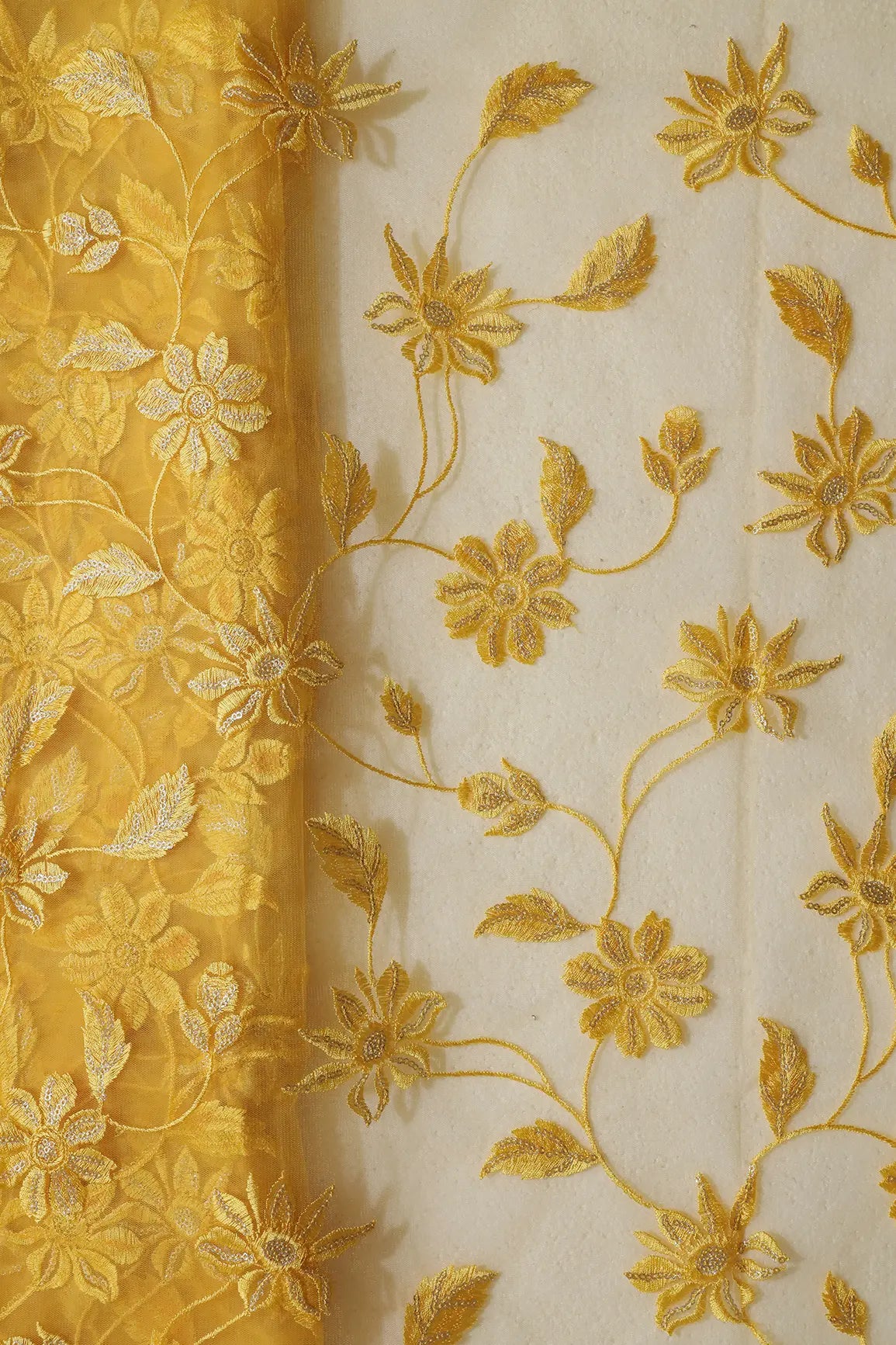 Yellow Thread With Gold  Sequins Floral Embroidery On Yellow Soft Net Fabric