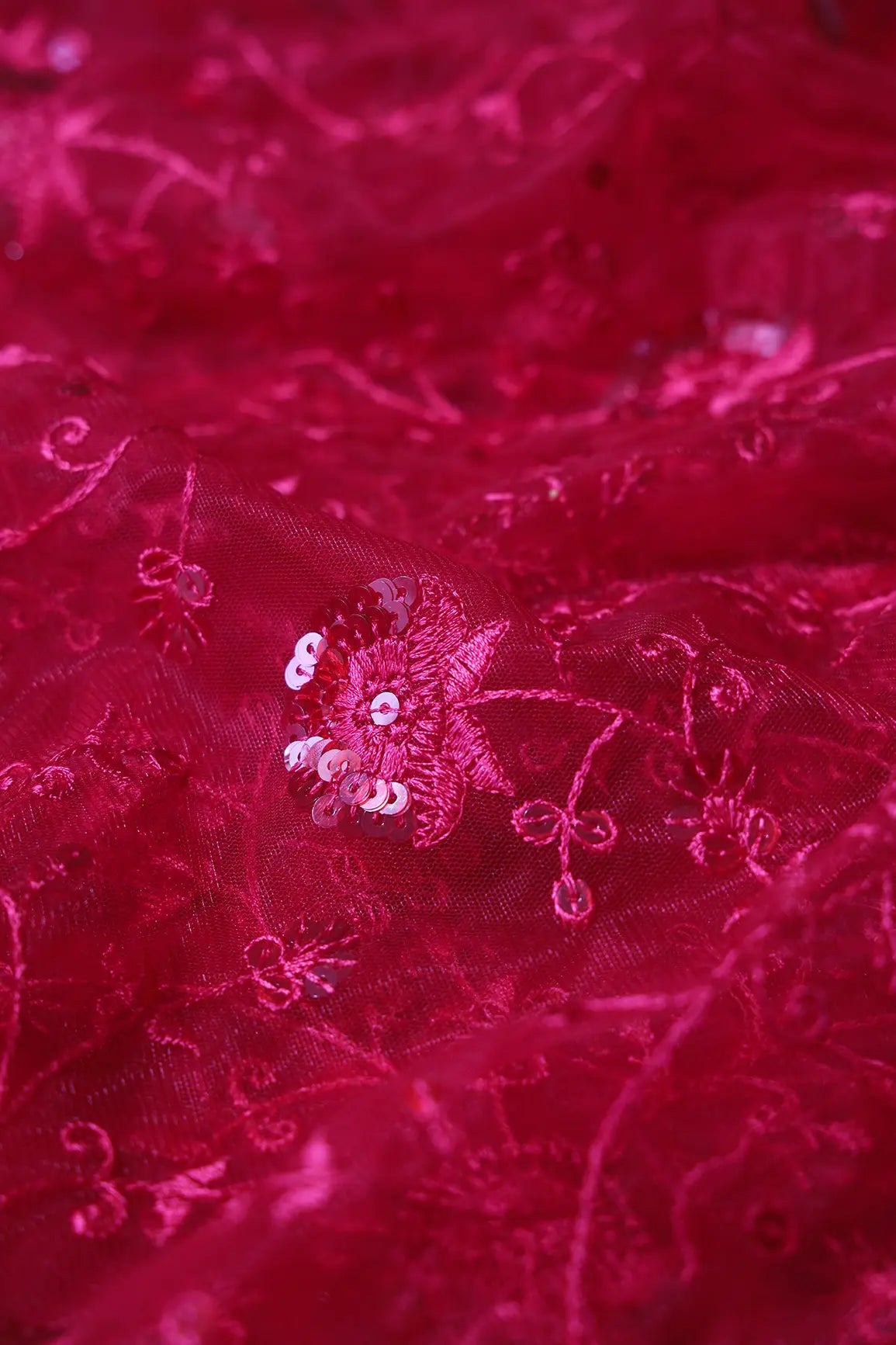 Red Thread With Red Sequins Floral Embroidery On Red Soft Net Fabric