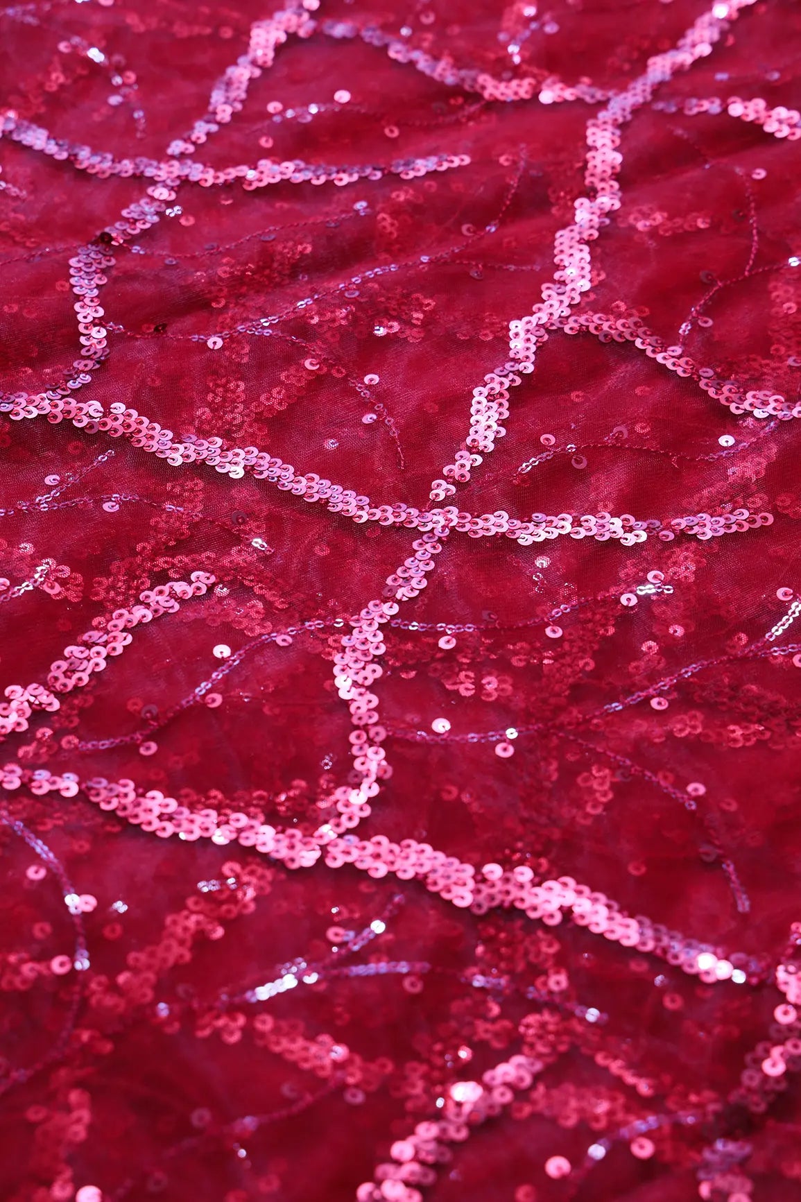 Red Sequins Geometric Embroidery On Red Soft Net Fabric