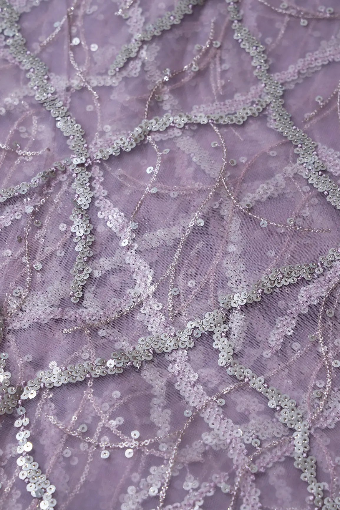 Silver Sequins Geometric Embroidery On Lilac Soft Net Fabric