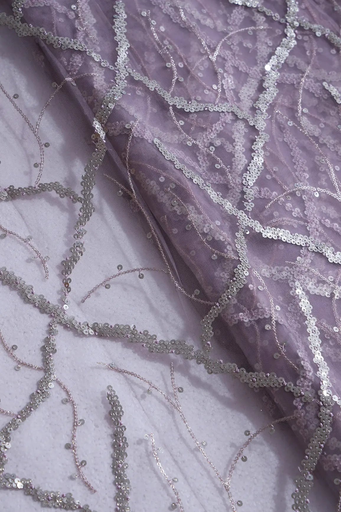 Silver Sequins Geometric Embroidery On Lilac Soft Net Fabric