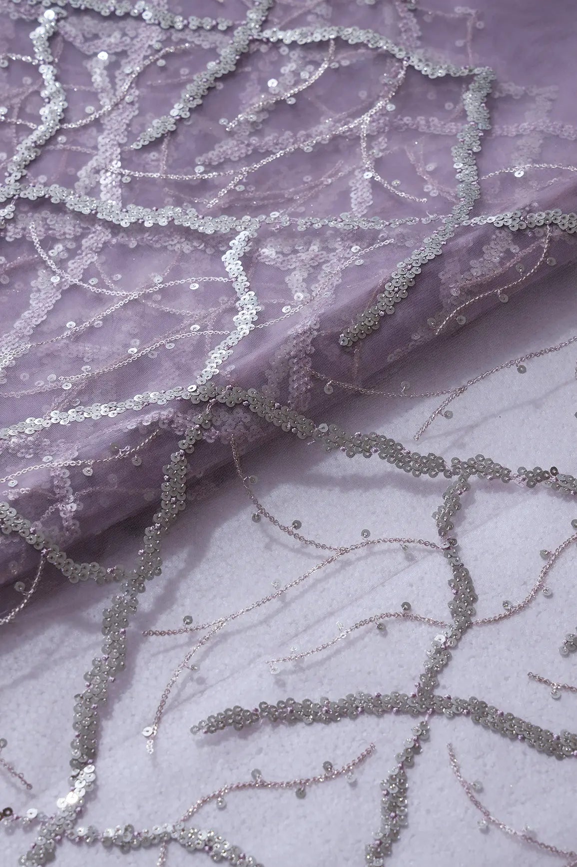 Silver Sequins Geometric Embroidery On Lilac Soft Net Fabric