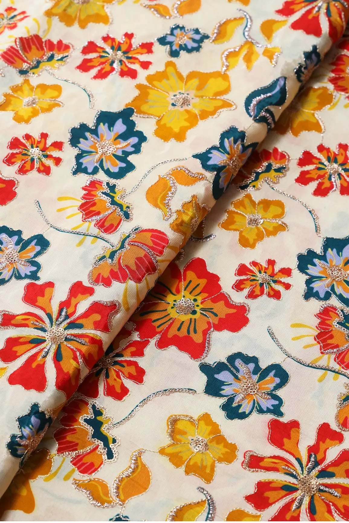 Red And Yellow Floral Positional Print With Gold Zari And Sequins Embroidery On Crepe Fabric