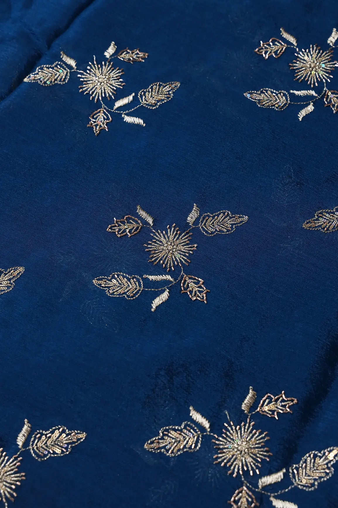 Gold Sequins With Beads And Gold Zari Floral Butta Embroidery On Prussian Blue Chinnon Chiffon Fabric