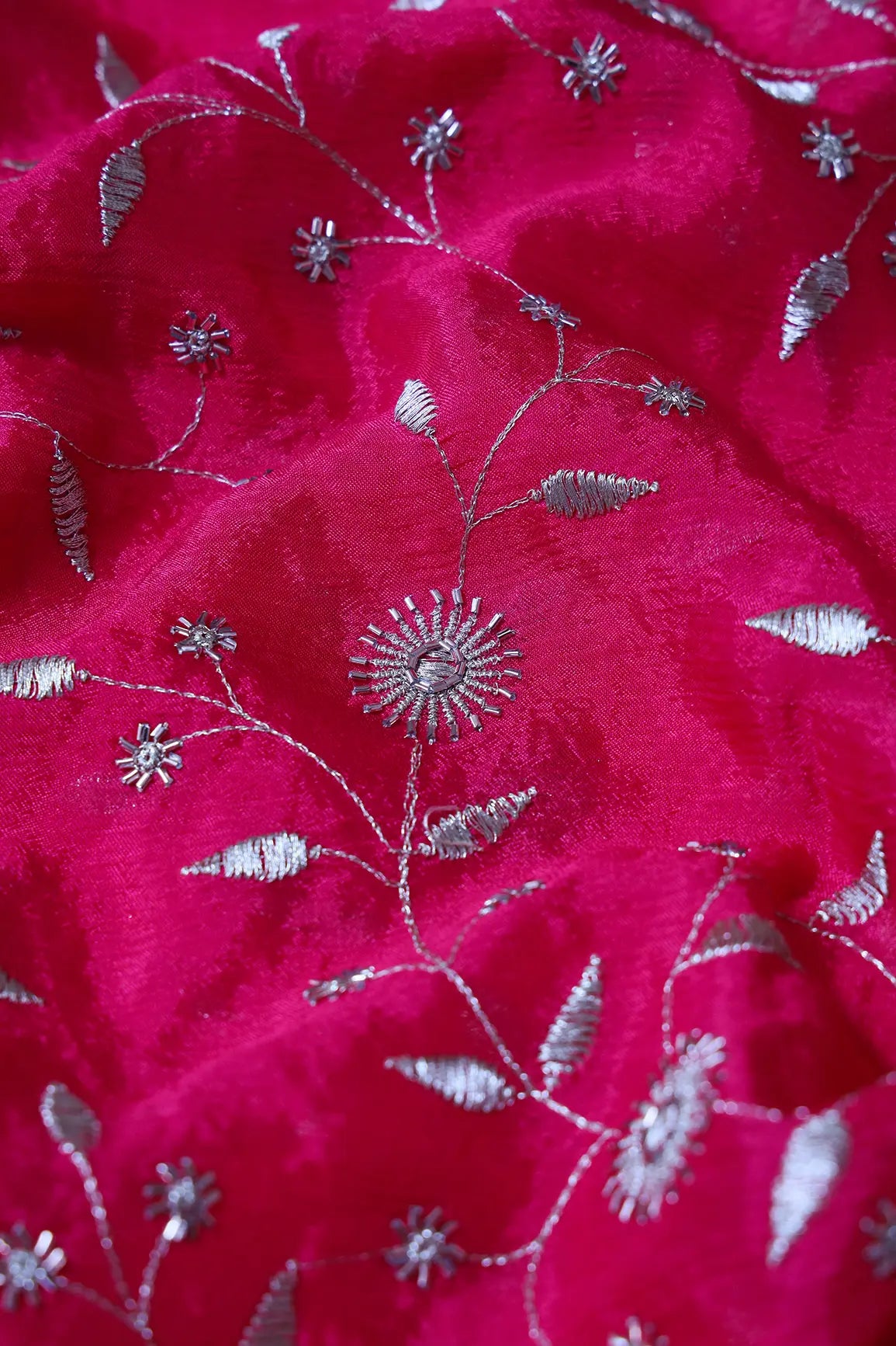 Gold Beads With Gold Zari Floral Embroidery On Fuchsia Chinnon Chiffon Fabric