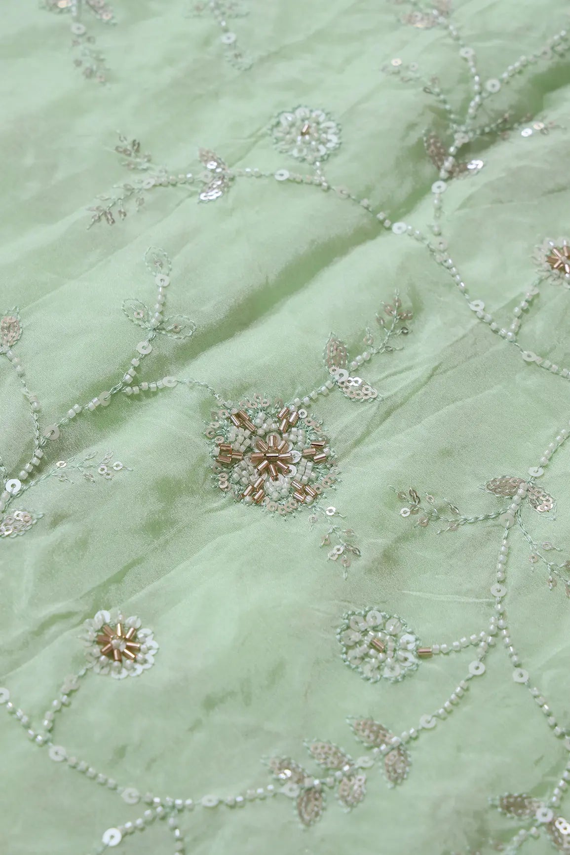 White Beads And Sequins Floral Embroidery On Pista Green Chinnon Chiffon Fabric