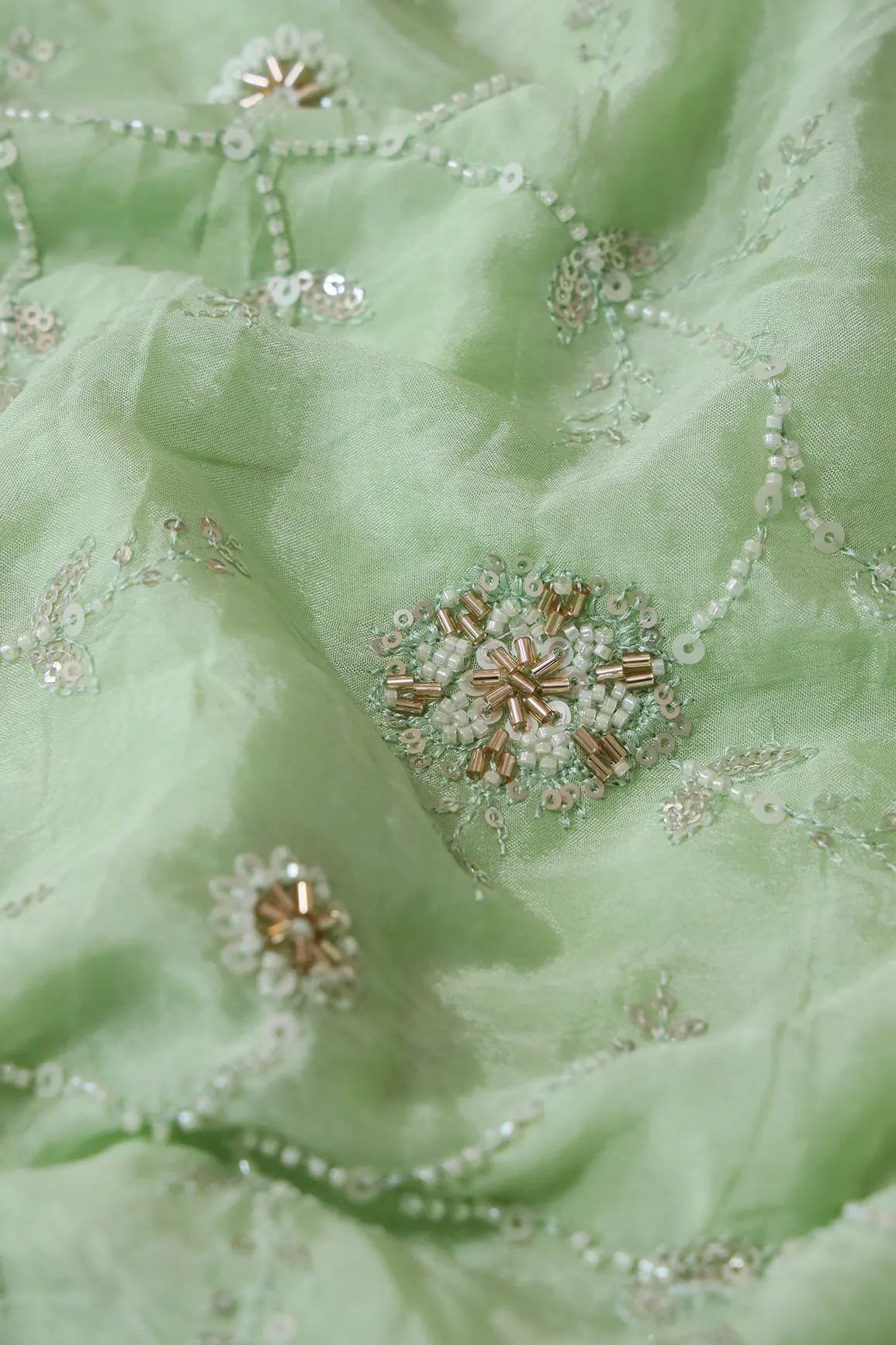 White Beads And Sequins Floral Embroidery On Pista Green Chinnon Chiffon Fabric