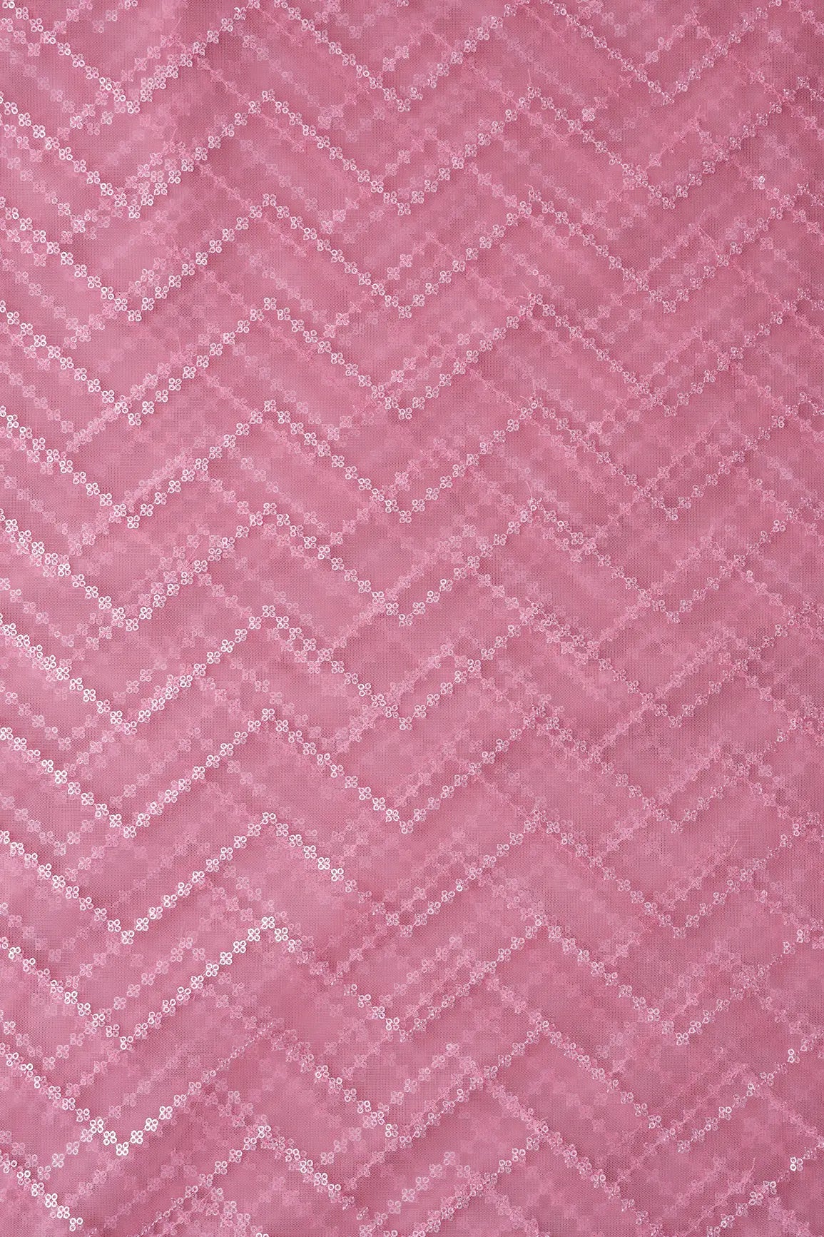 Silver Matt Sequins Chevron Embroidery Work On Pink Soft Net Fabric