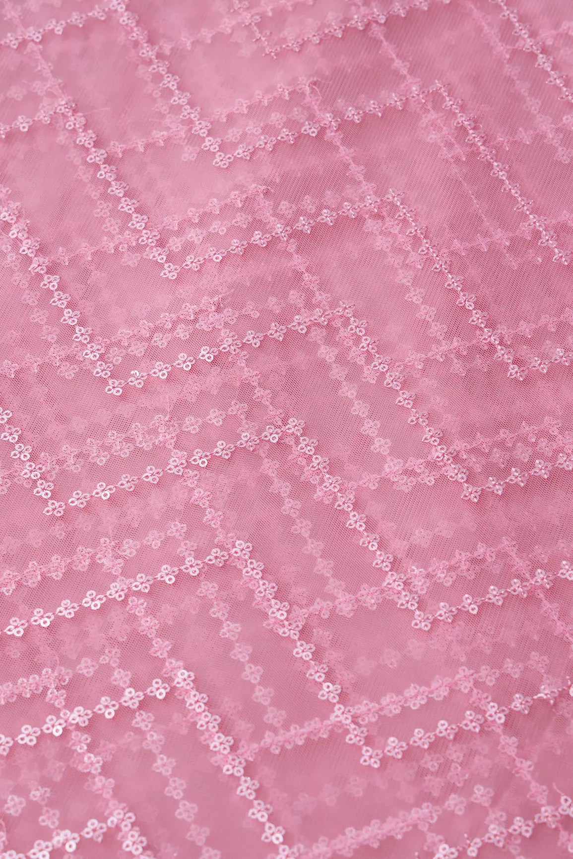 Silver Matt Sequins Chevron Embroidery Work On Pink Soft Net Fabric