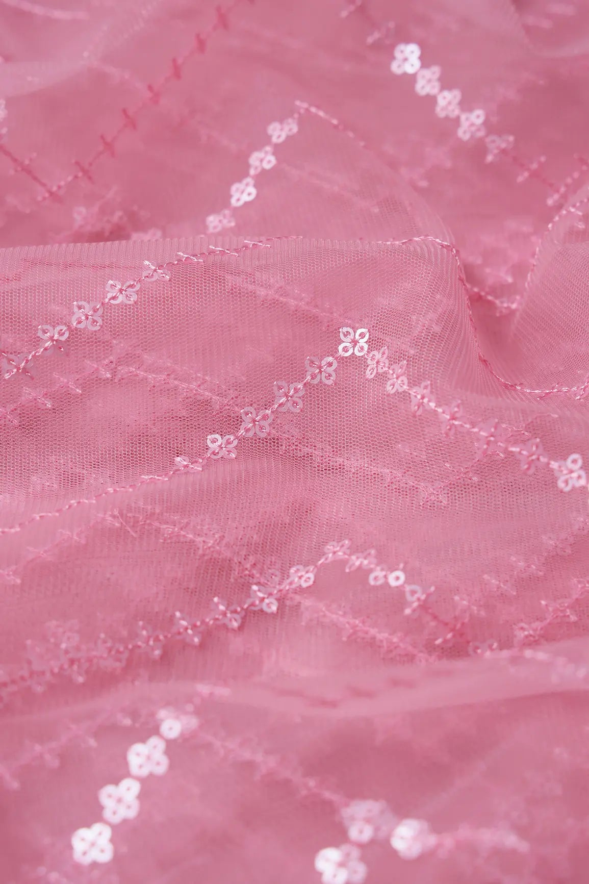 Silver Matt Sequins Chevron Embroidery Work On Pink Soft Net Fabric