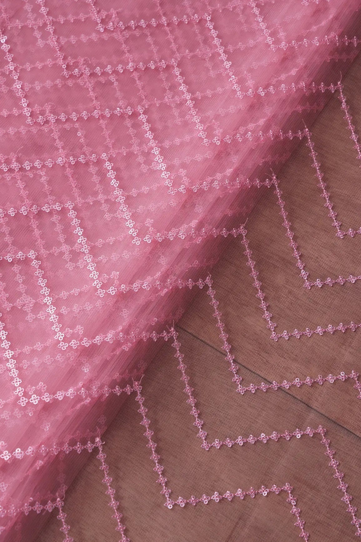 Silver Matt Sequins Chevron Embroidery Work On Pink Soft Net Fabric