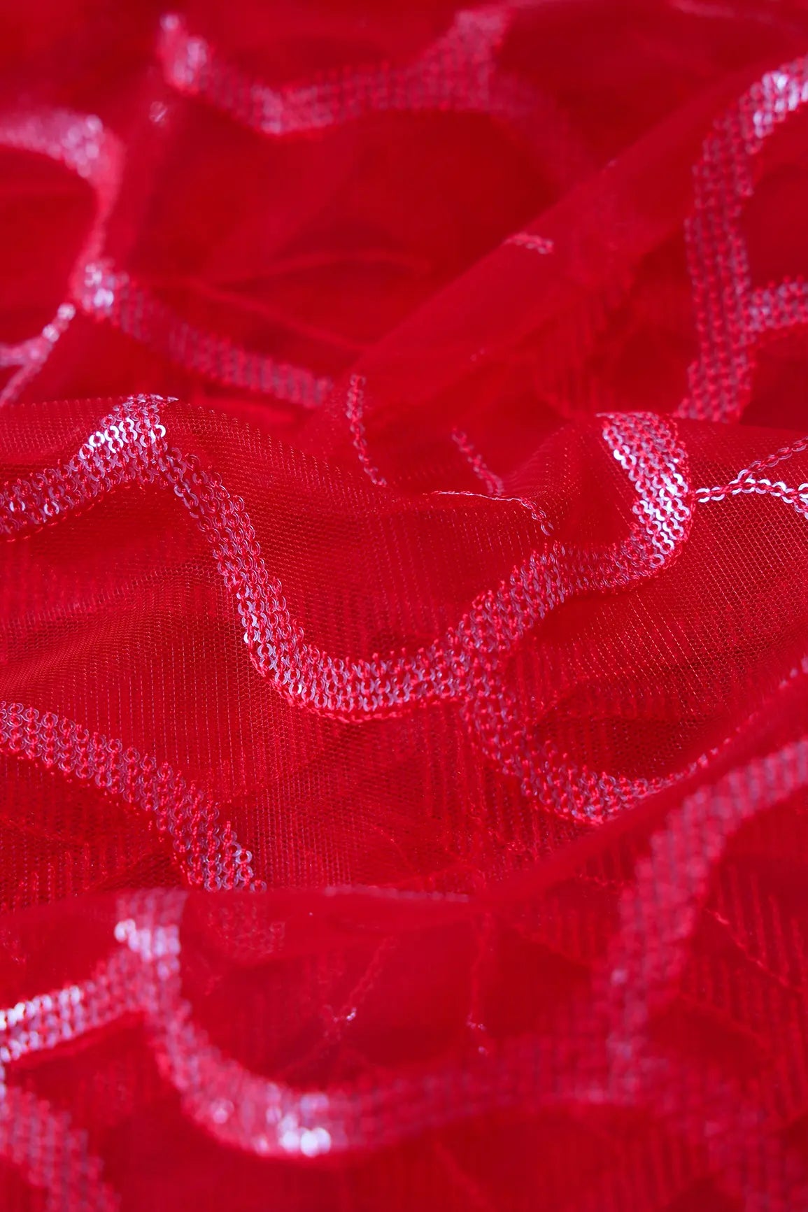 Red Thread With Water Sequins Abstract Embroidery Work On Red Soft Net Fabric