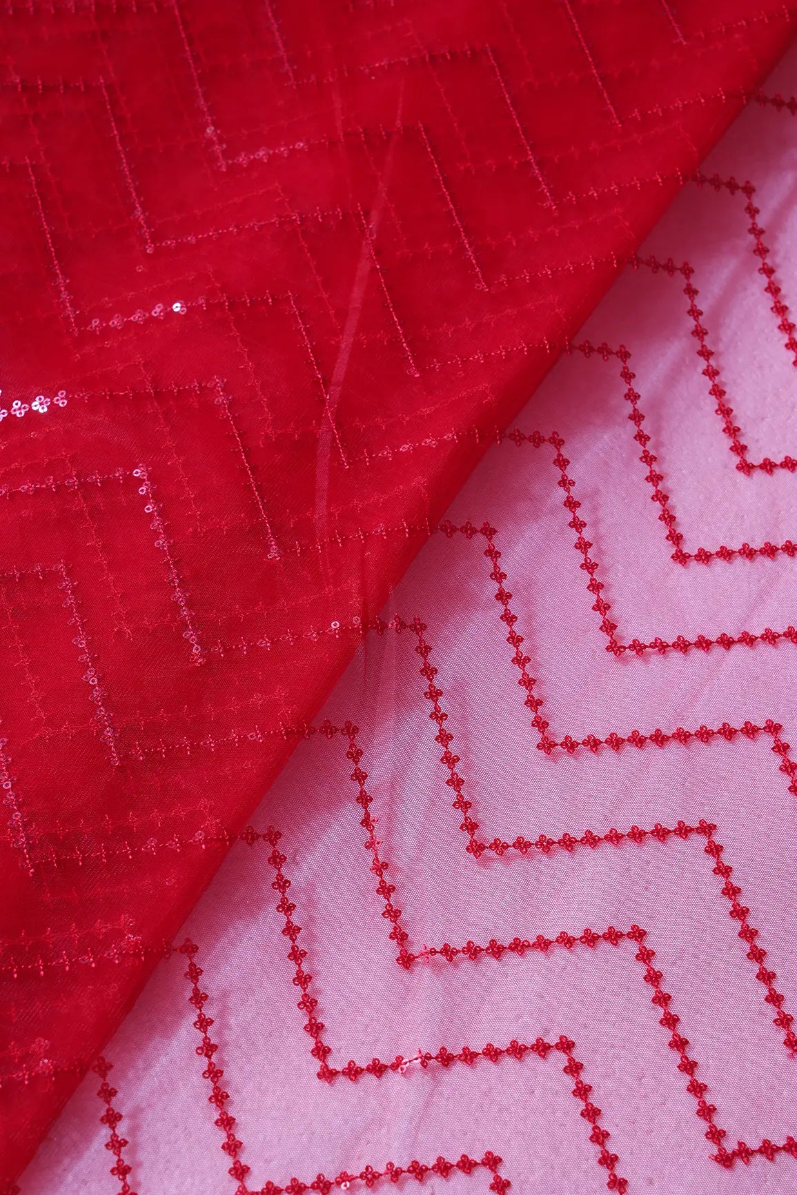 Red Sequins Chevron Embroidery Work On Red Soft Net Fabric