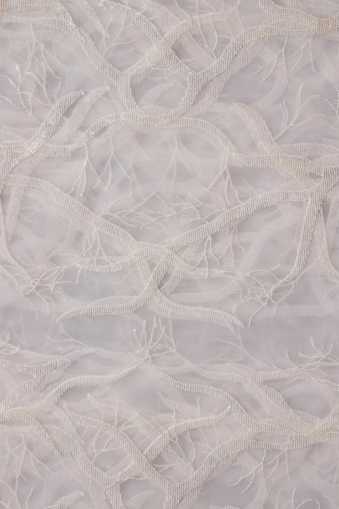 White Thread With Water Sequins Abstract Embroidery Work On Dyeable White Soft Net Fabric