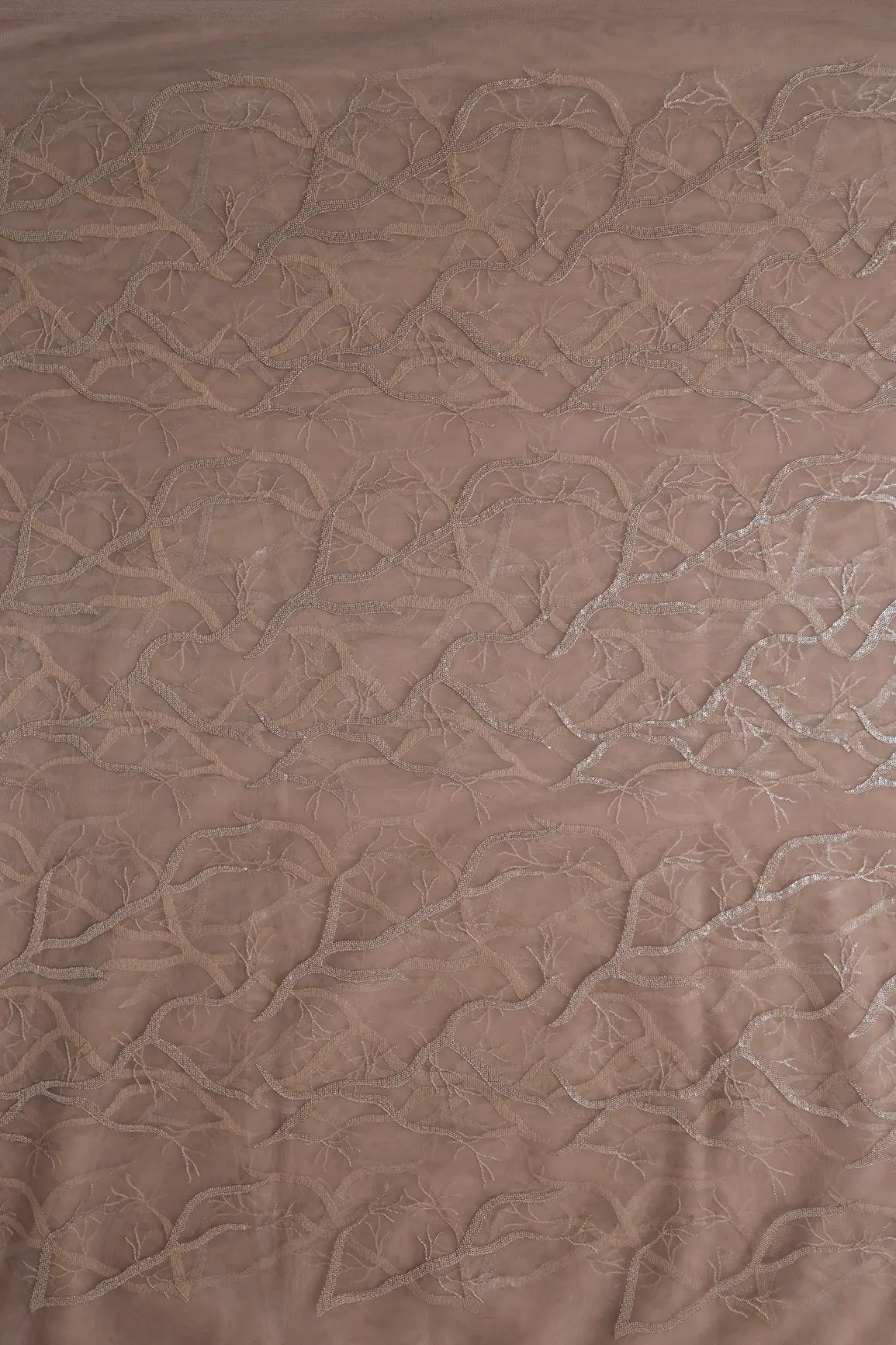 Beige Thread With Water Sequins Abstract Embroidery Work On Dark Beige Soft Net Fabric