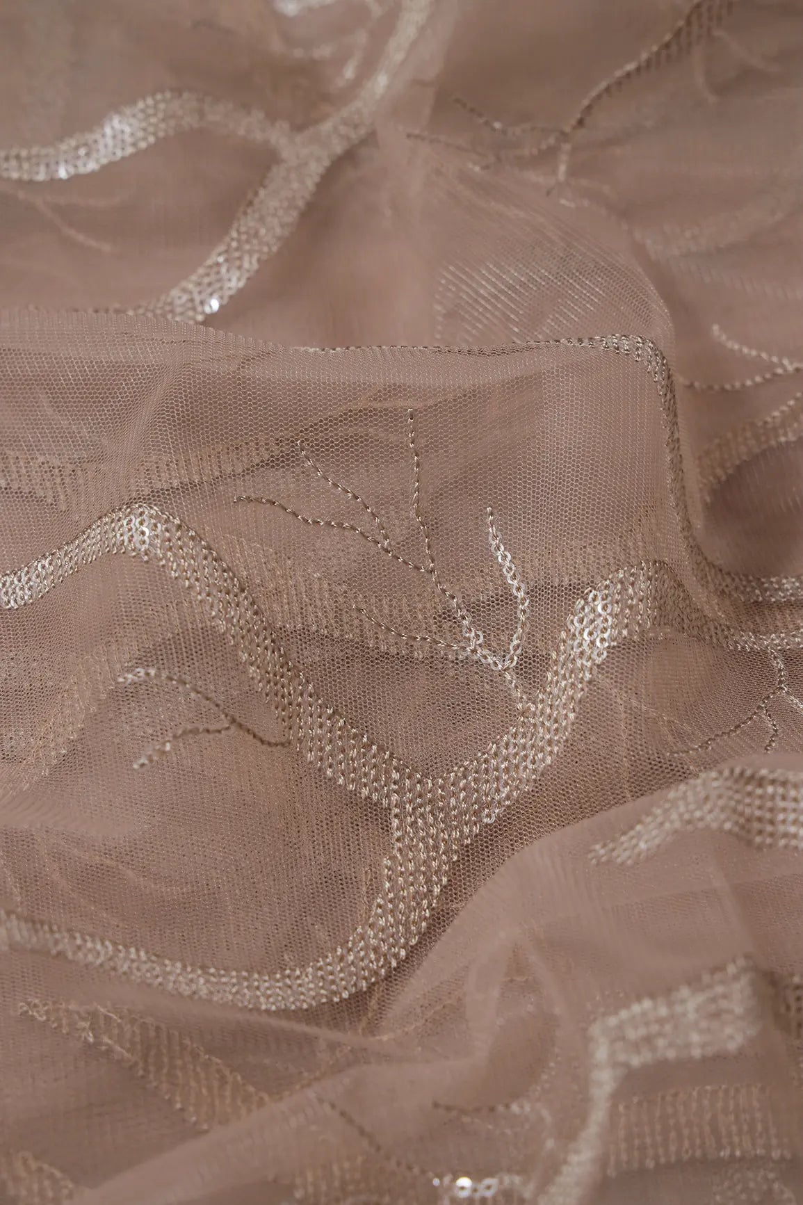 Beige Thread With Water Sequins Abstract Embroidery Work On Dark Beige Soft Net Fabric