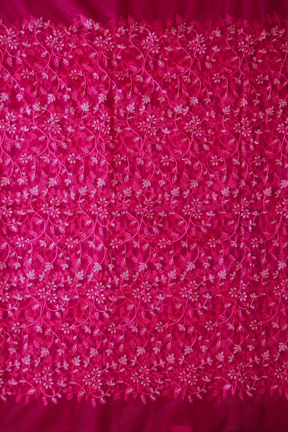 Beautiful Gold Glitter Sequins Heavy Floral Embroidery On Fuchsia Soft Net Fabric