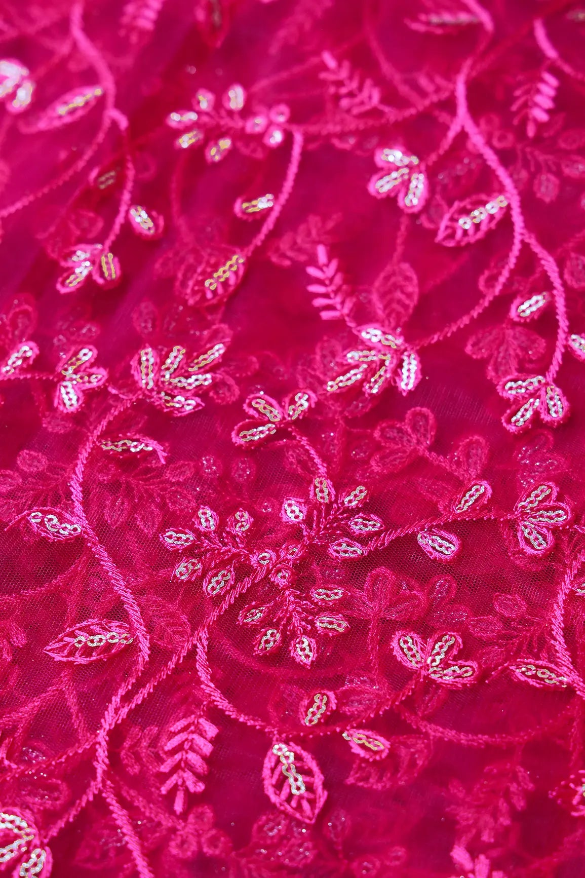 Beautiful Gold Glitter Sequins Heavy Floral Embroidery On Fuchsia Soft Net Fabric