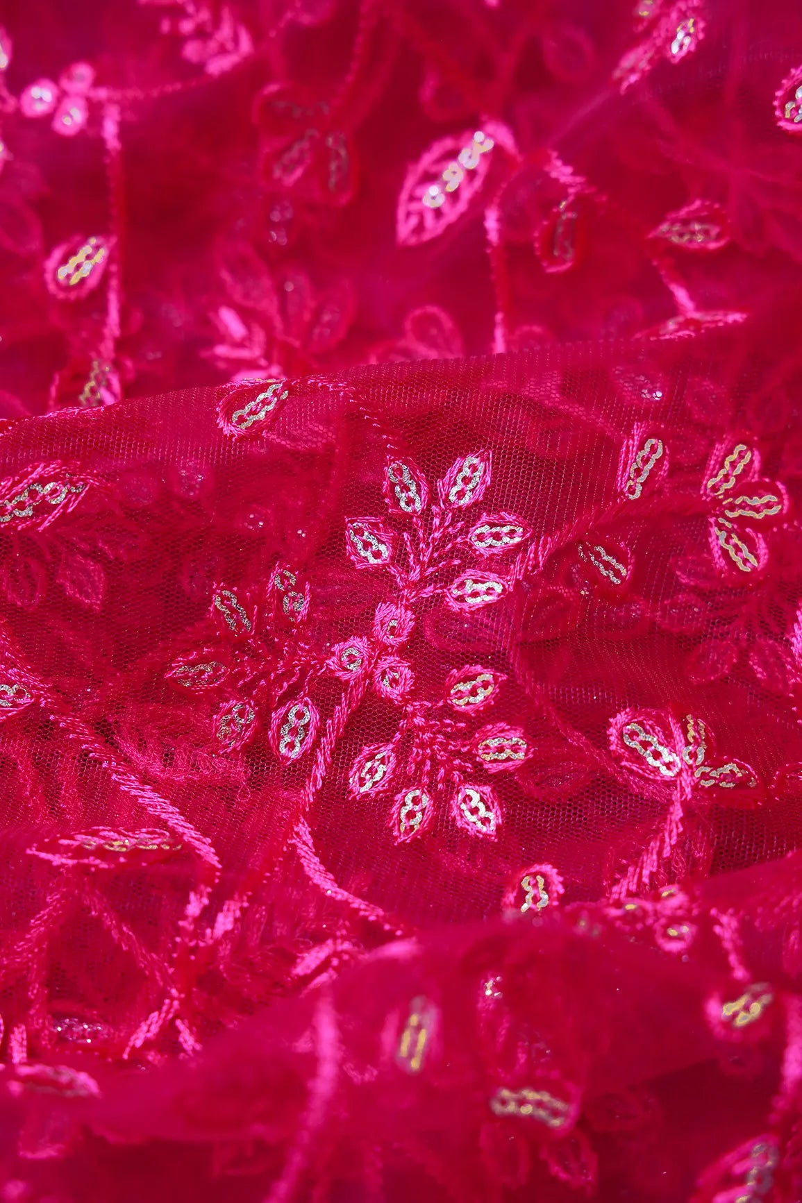 Beautiful Gold Glitter Sequins Heavy Floral Embroidery On Fuchsia Soft Net Fabric