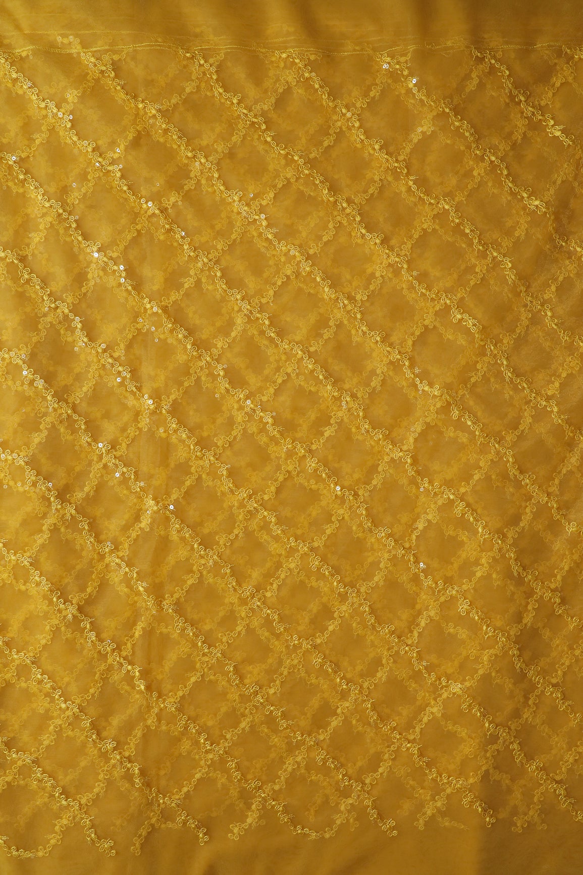 Yellow Thread With Sequins Strip Embroidery Work On Yellow Soft Net Fabric