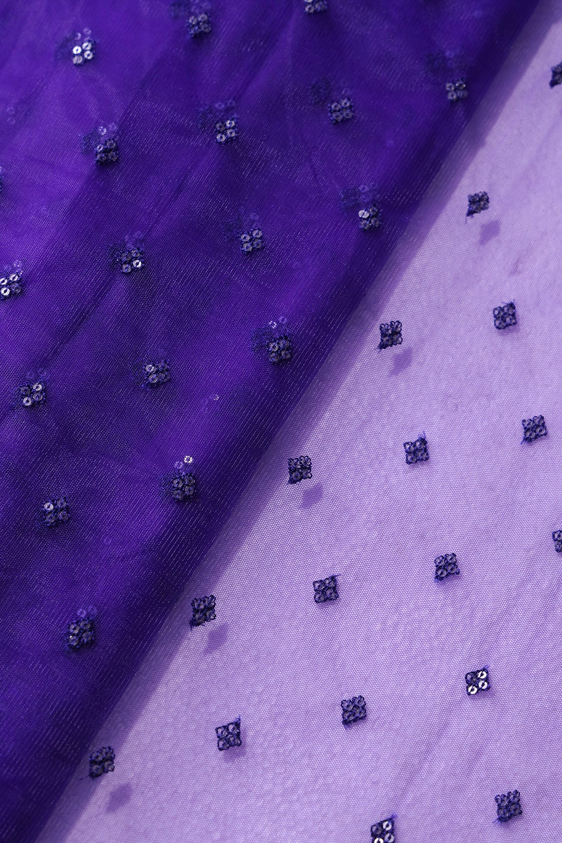 Small Motif Sequins Embroidery Work On Dark Purple Soft Net Fabric