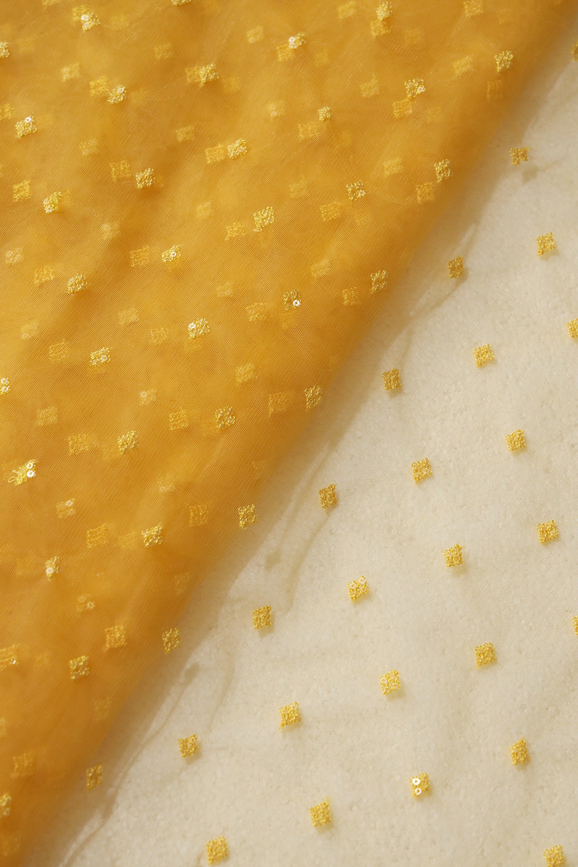 Small Motif Sequins Embroidery Work On Yellow Soft Net Fabric