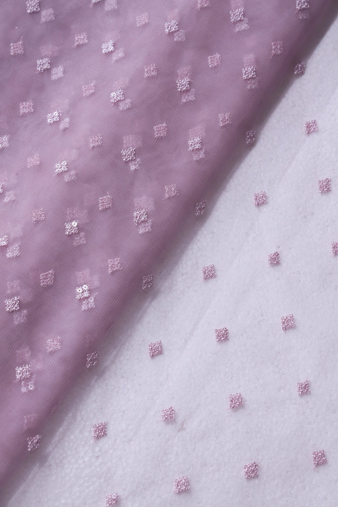 Small Motif Sequins Embroidery Work On Lilac Purple Soft Net Fabric